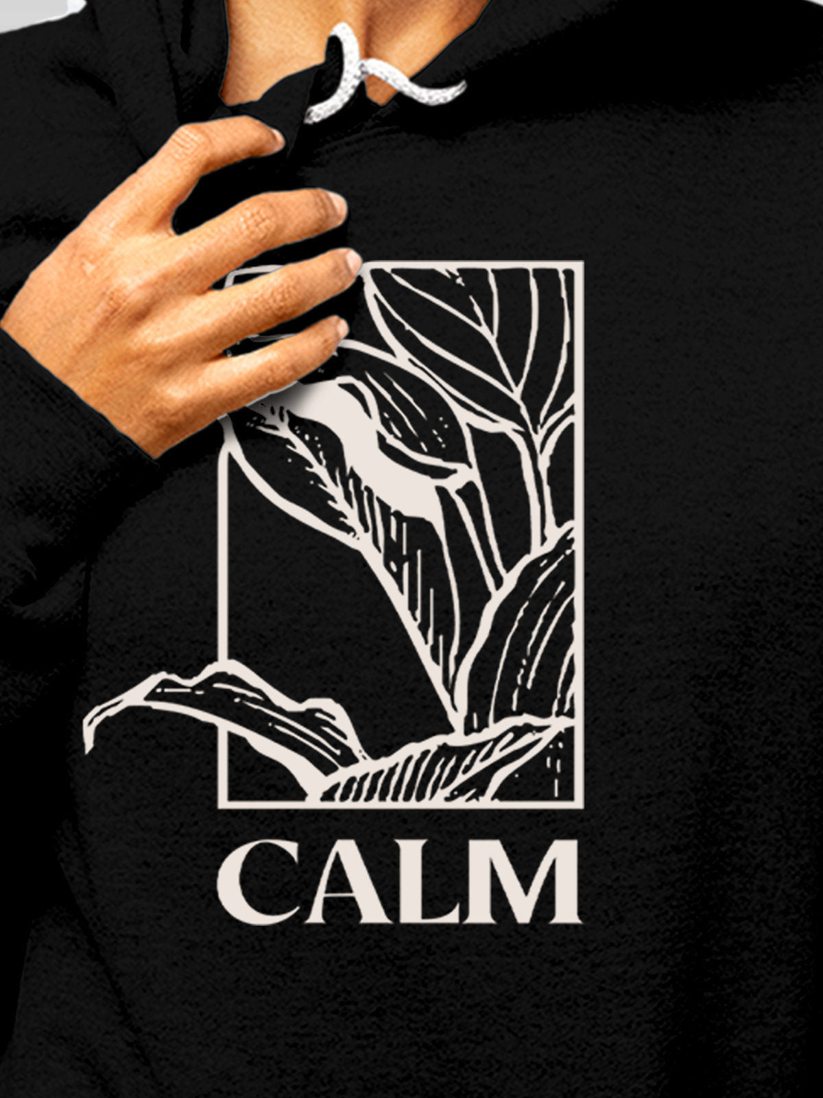 Close up of 'Calm' design on Women's Black Hoodie Sweatshirt, highlighting intricate details and vibrant print.
