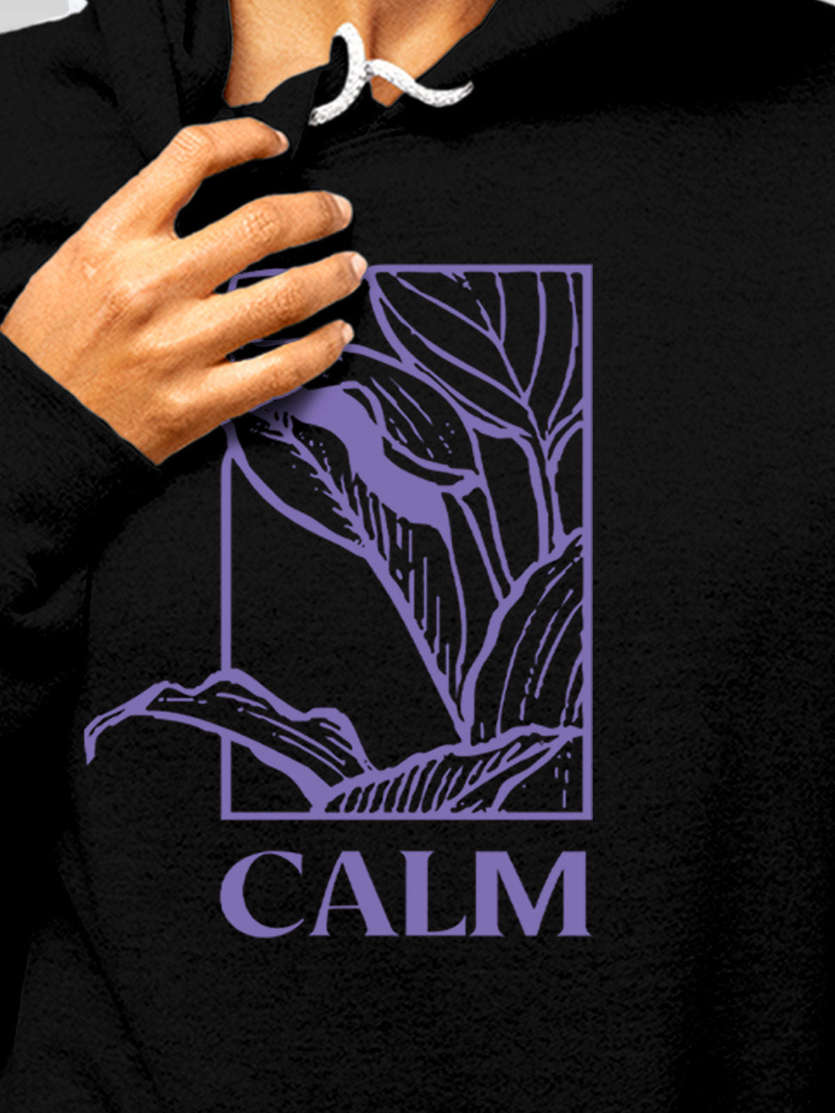 Close up of 'Calm' design on Women's Black Hoodie Sweatshirt, highlighting intricate details and vibrant print.