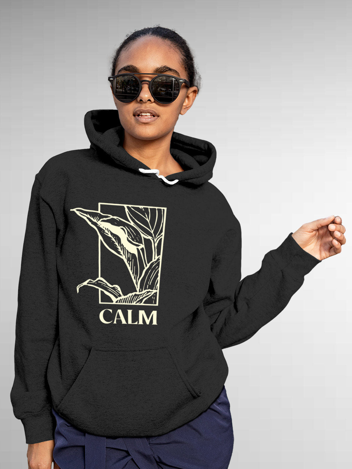 Model wearing Women's Dark Grey Hoodie Sweatshirt with 'Calm' design, offering effortless style and premium comfort