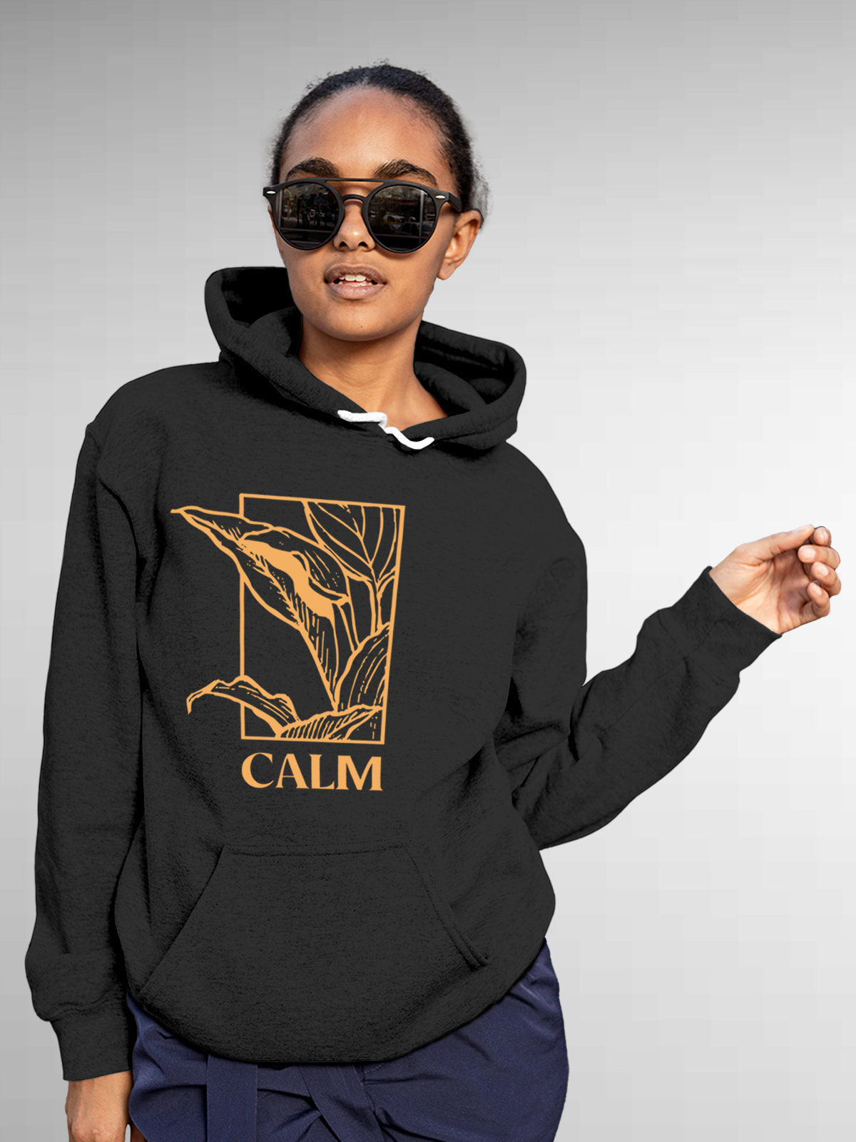 Model wearing Women's Dark Grey Hoodie Sweatshirt with 'Calm' design, offering effortless style and premium comfort