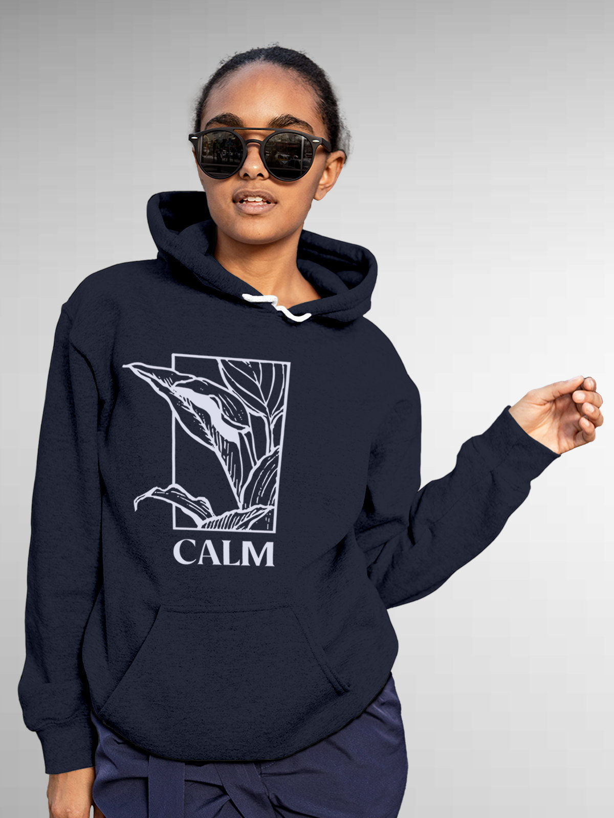 Model wearing Women's Navy Blue Hoodie Sweatshirt with 'Calm' design, offering effortless style and premium comfort