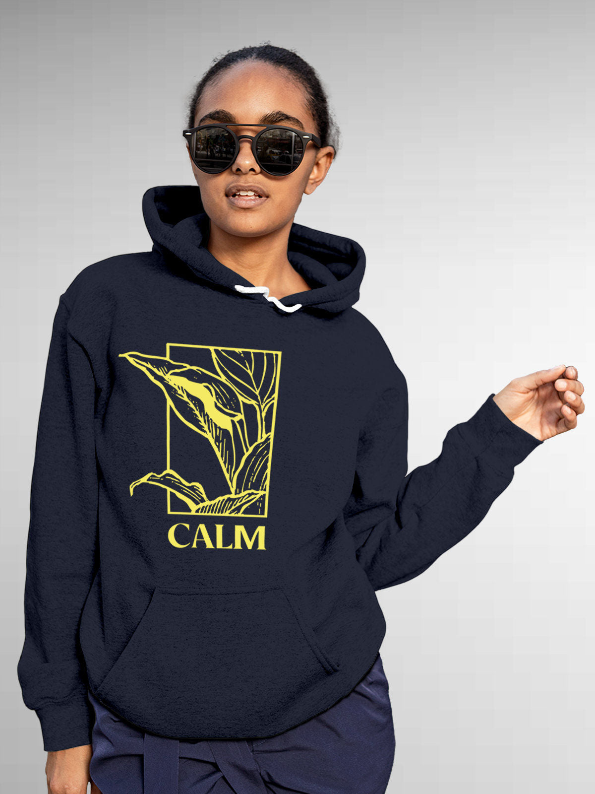 Model wearing Women's Navy Blue Hoodie Sweatshirt with 'Calm' design, offering effortless style and premium comfort