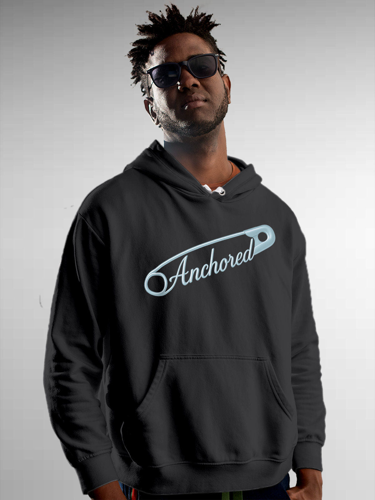 Model wearing Men's Dark Grey Hoodie Sweatshirt with 'Anchored' design, offering effortless style and premium comfort