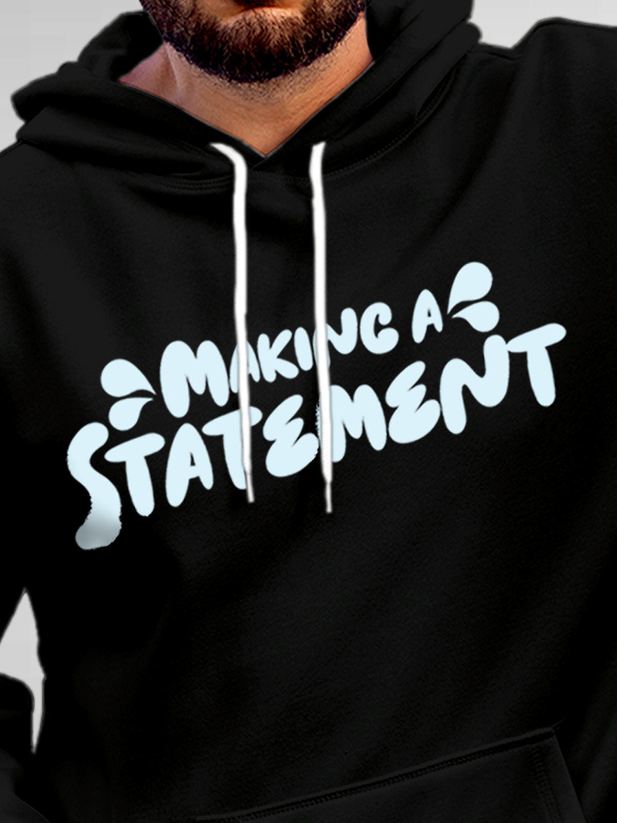 Close up of 'Making A Statement' design on Men's Black Hoodie Sweatshirt, highlighting intricate details and vibrant print.
