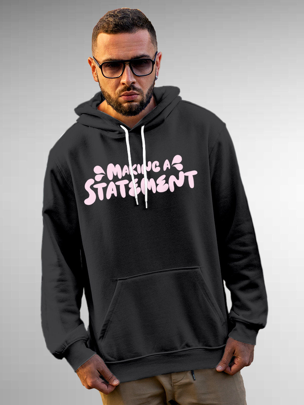 Model wearing Men's Dark Grey Hoodie Sweatshirt with 'Making A Statement' design, offering effortless style and premium comfort