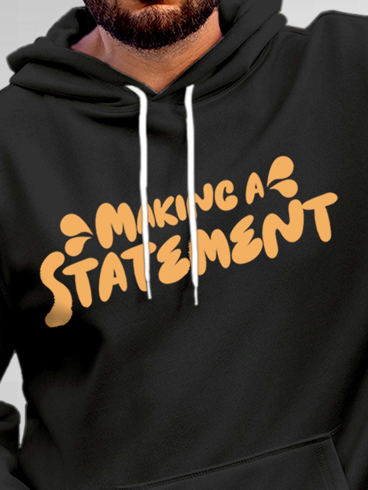 Close up of 'Making A Statement' design on Men's Dark Grey Hoodie Sweatshirt, highlighting intricate details and vibrant print.