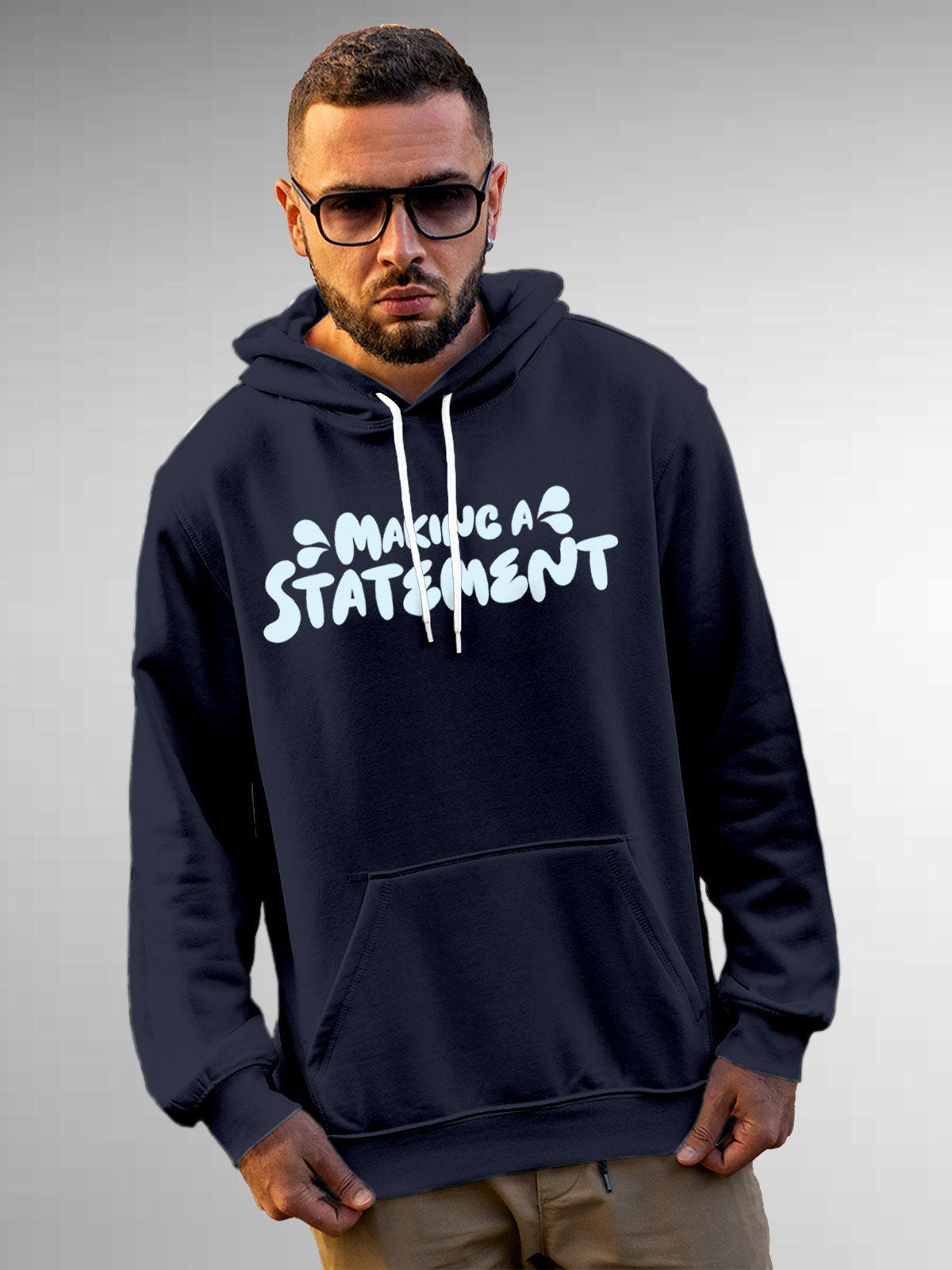 Model wearing Men's Navy Blue Hoodie Sweatshirt with 'Making A Statement' design, offering effortless style and premium comfort