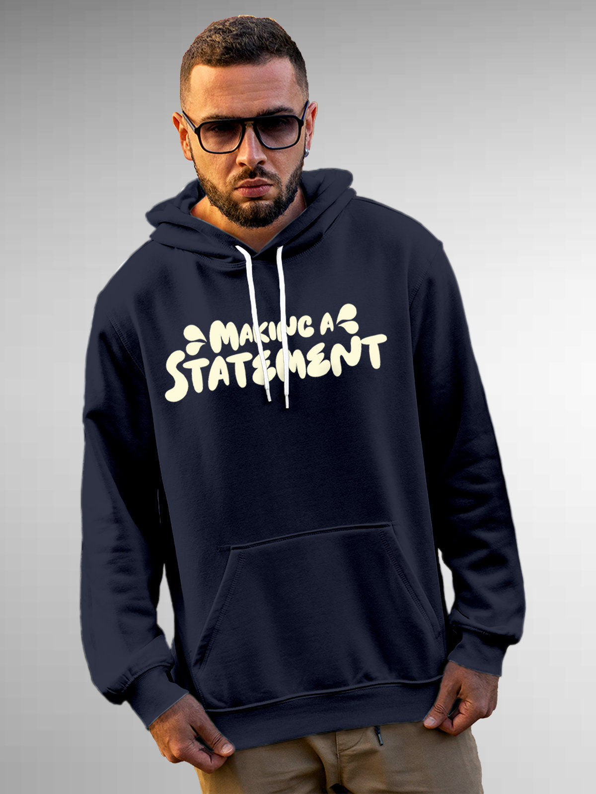 Model wearing Men's Navy Blue Hoodie Sweatshirt with 'Making A Statement' design, offering effortless style and premium comfort