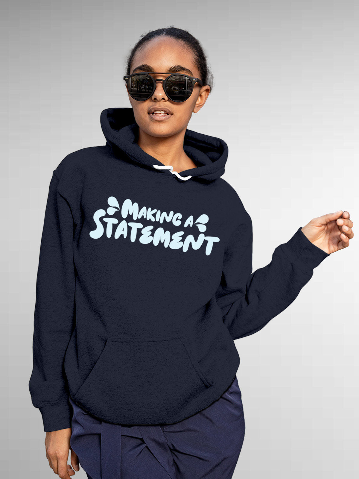 Model wearing Women's Navy Blue Hoodie Sweatshirt with 'Making A Statement' design, offering effortless style and premium comfort