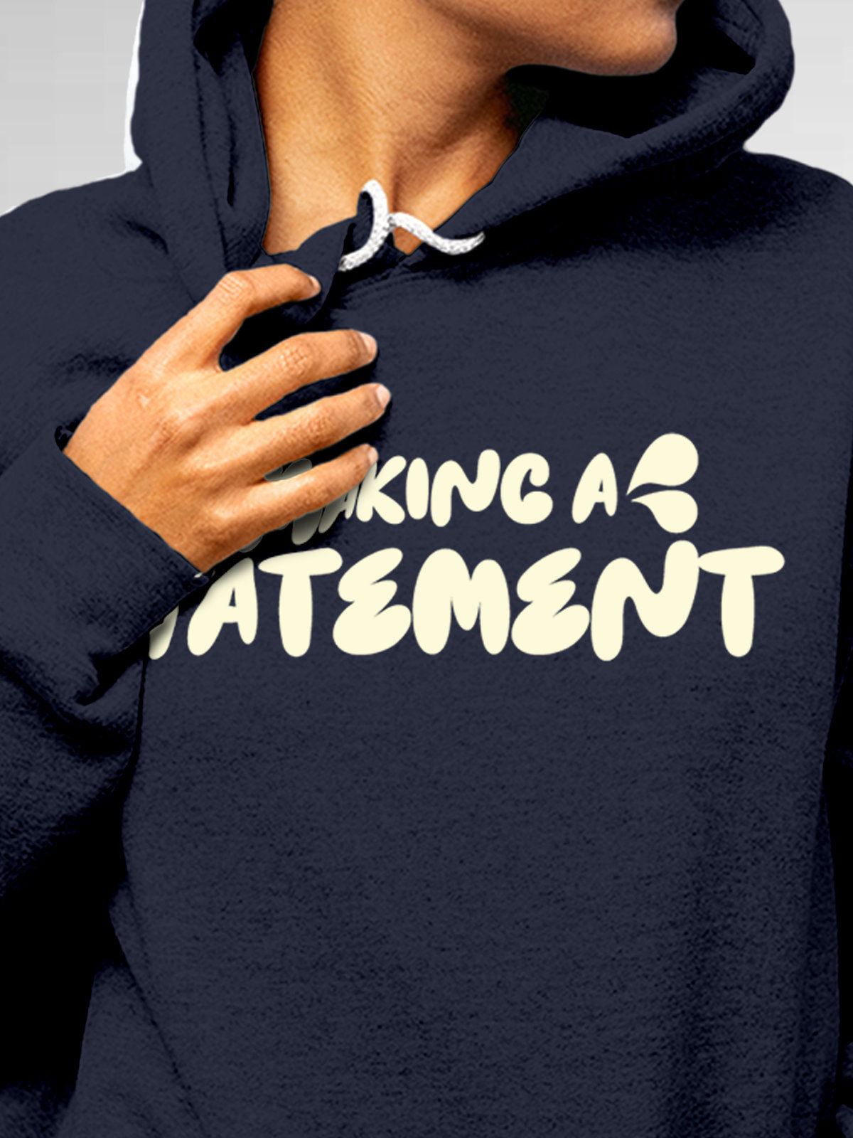 Close up of 'Making A Statement' design on Women's Navy Blue Hoodie Sweatshirt, highlighting intricate details and vibrant print.