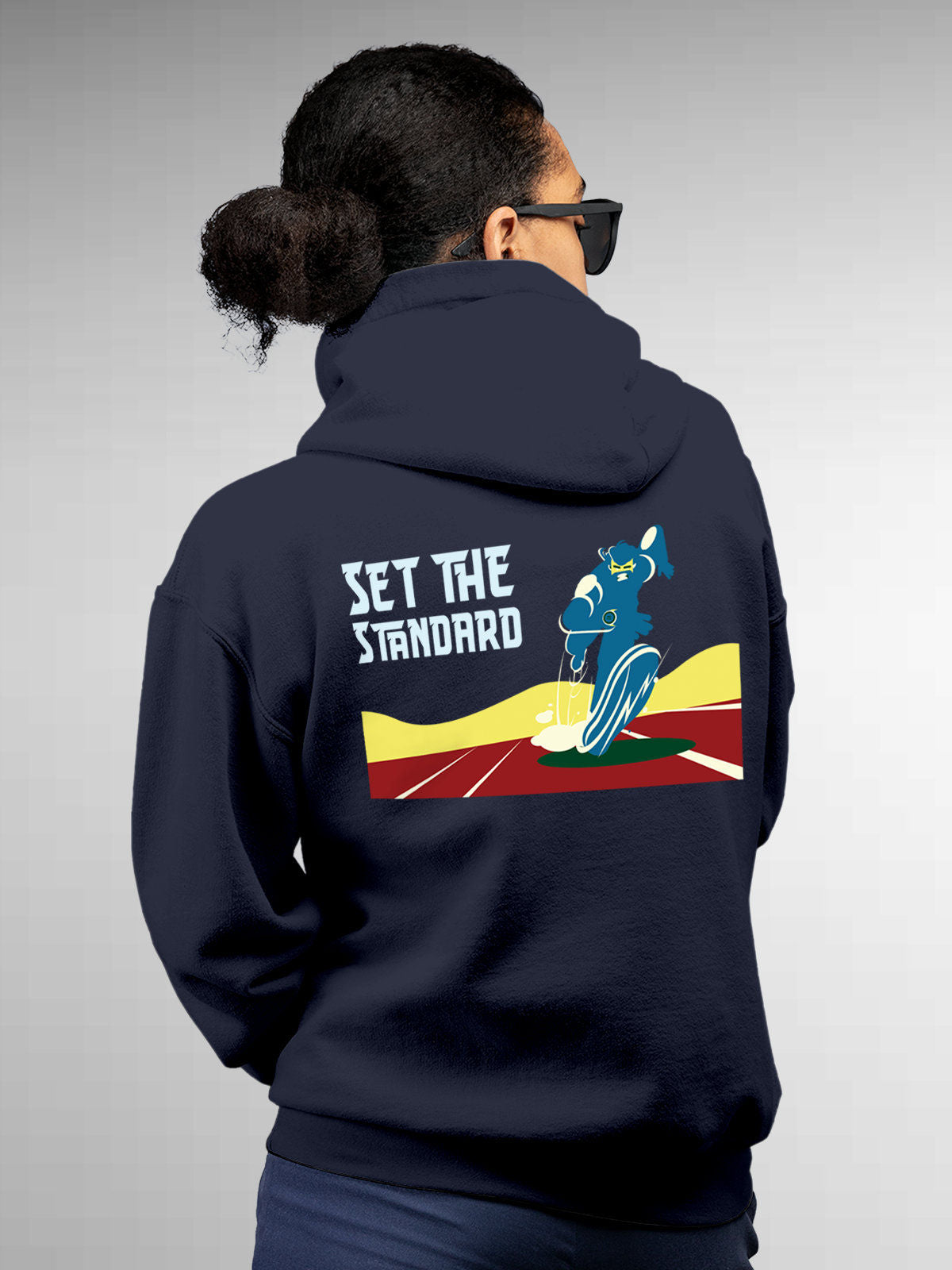 Model wearing Women's Navy Blue Hoodie Sweatshirt with 'Raise The Bar' design, offering effortless style and premium comfort