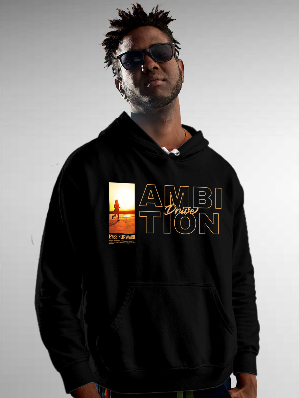 Model wearing Men's Black Hoodie Sweatshirt with 'Ambition & Drive' design, offering effortless style and premium comfort