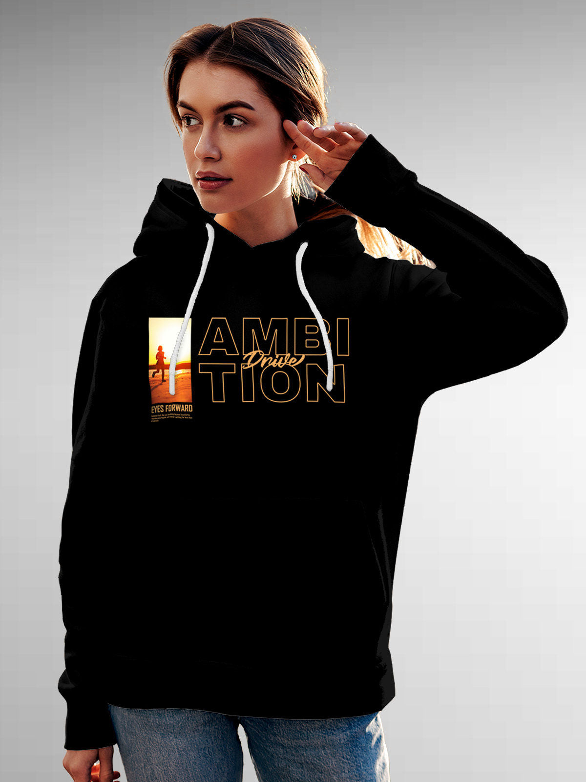 Model wearing Women's Black Hoodie Sweatshirt with 'Ambition & Drive' design, offering effortless style and premium comfort