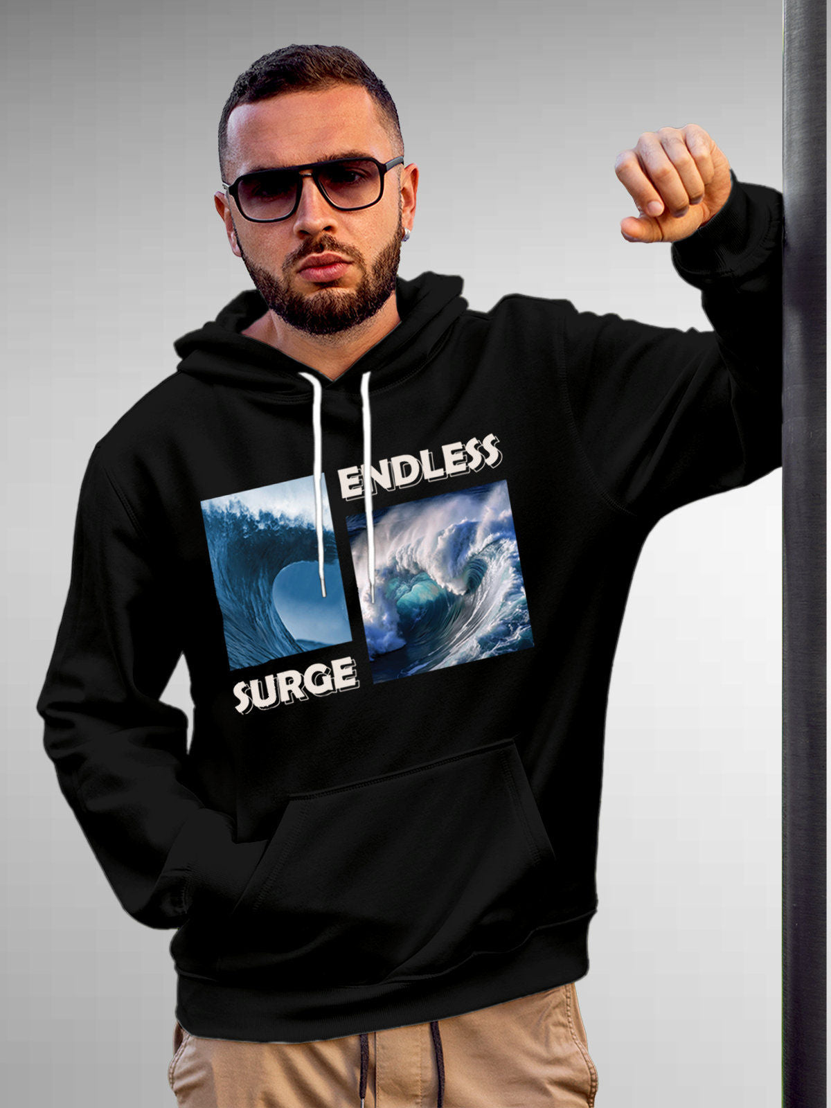 Model wearing Men's Black Hoodie Sweatshirt with 'Endless Surge' design, offering effortless style and premium comfort