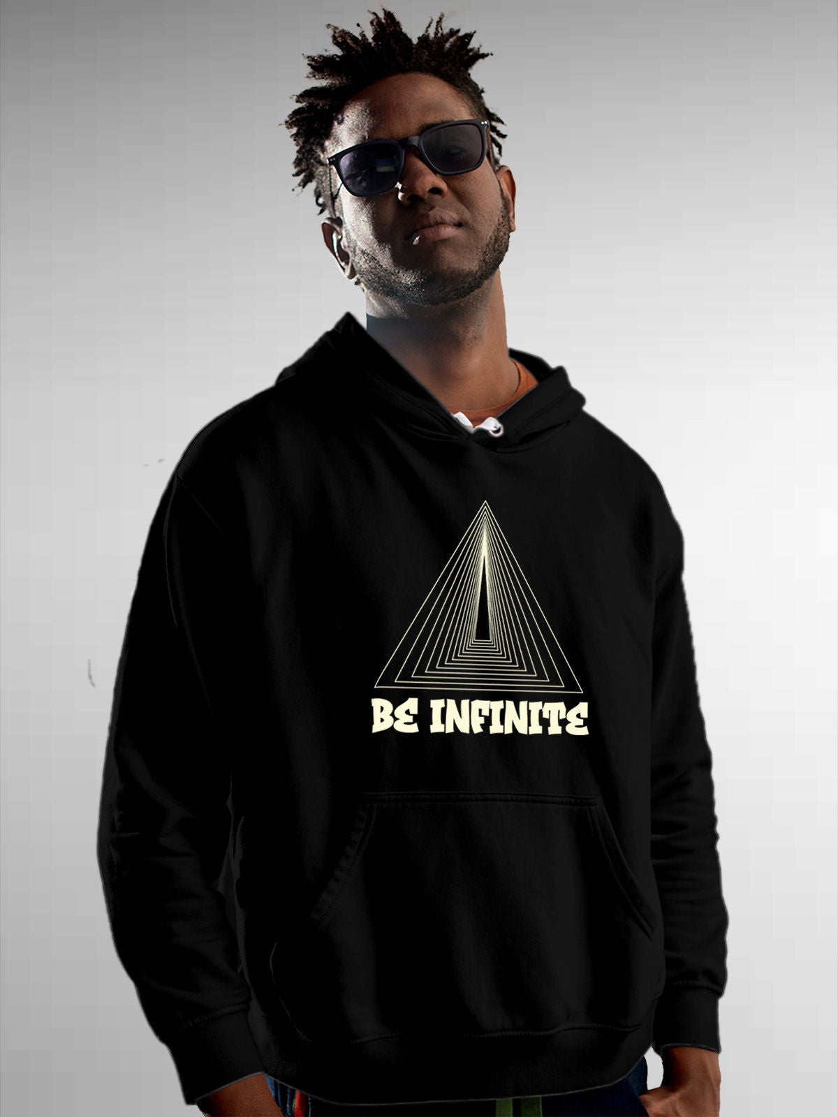 Model wearing Men's Black Hoodie Sweatshirt with 'Be Infinite' design, offering effortless style and premium comfort