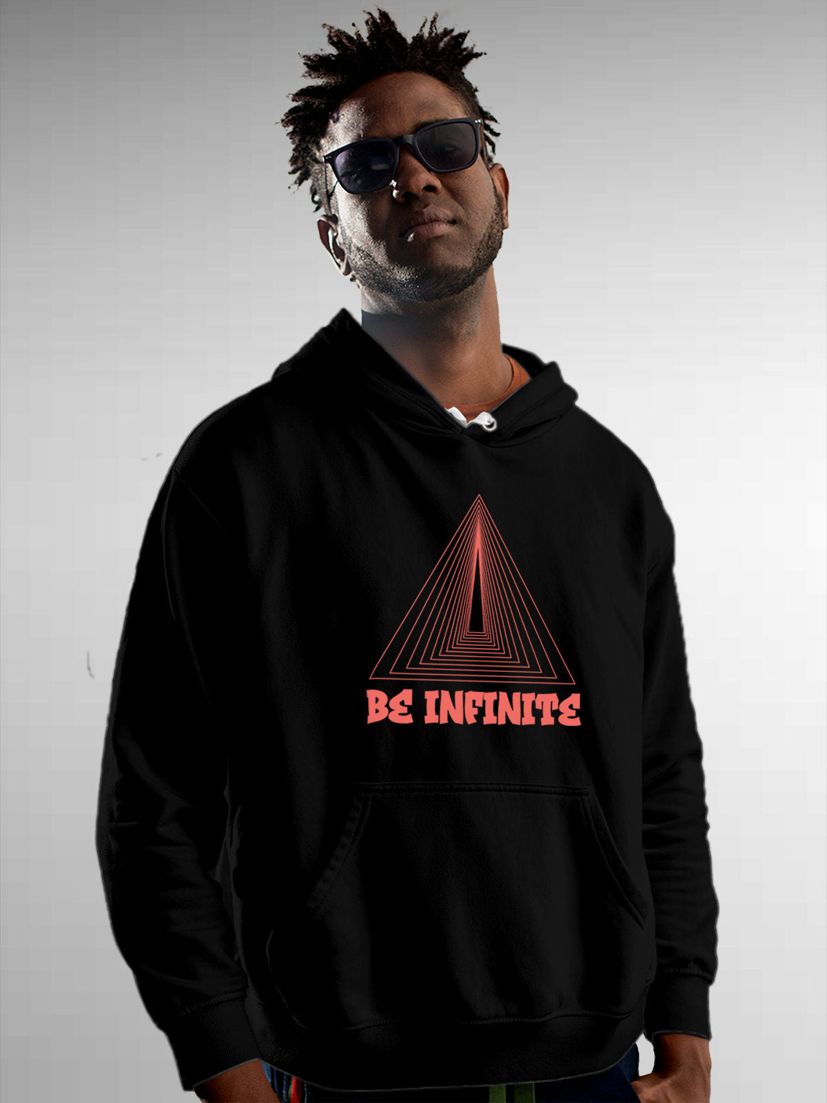 Model wearing Men's Black Hoodie Sweatshirt with 'Be Infinite' design, offering effortless style and premium comfort