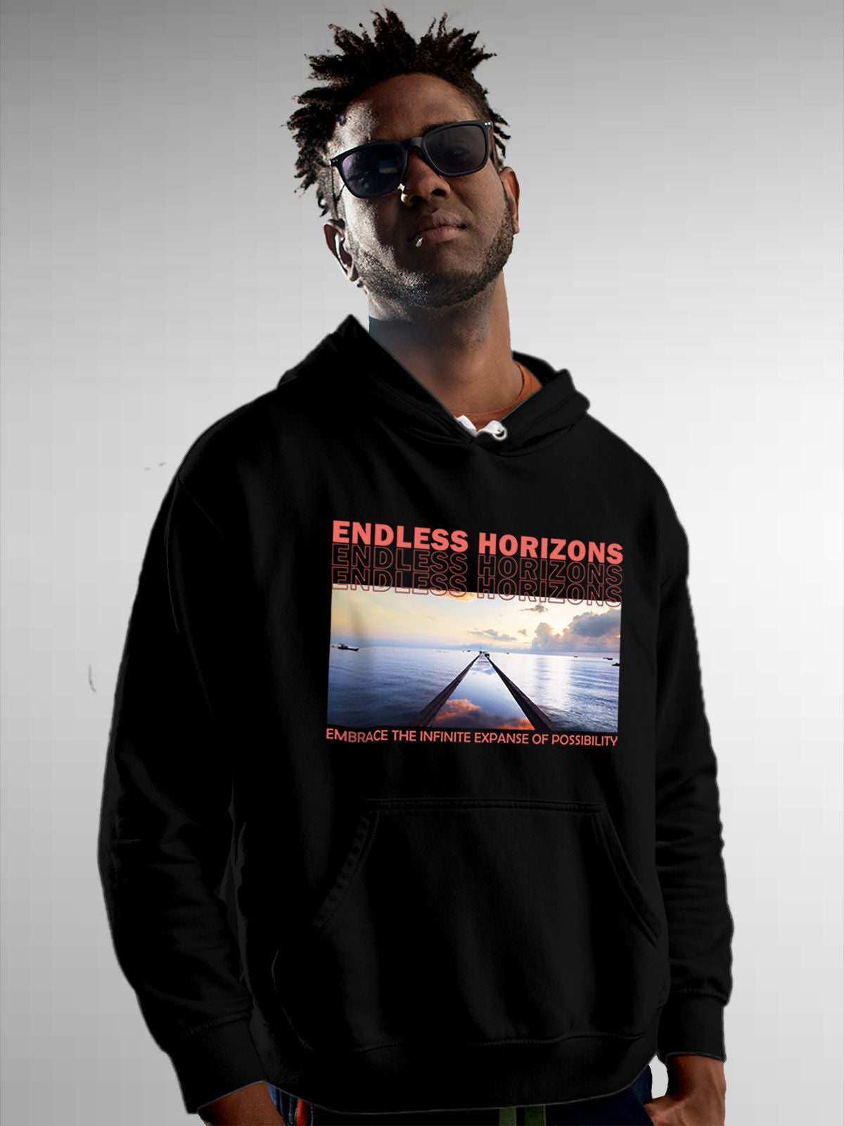 Model wearing Men's Black Hoodie Sweatshirt with 'Endless Horizons' design, offering effortless style and premium comfort
