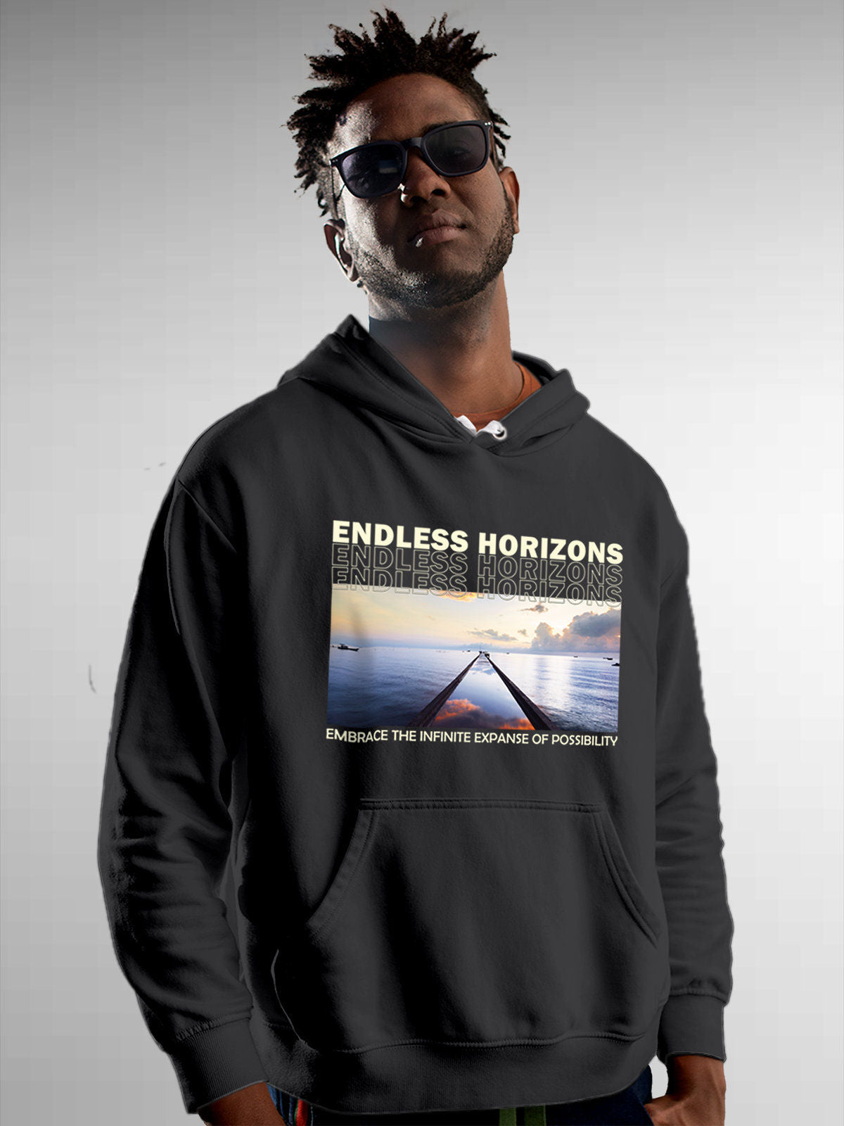Model wearing Men's Dark Grey Hoodie Sweatshirt with 'Endless Horizons' design, offering effortless style and premium comfort