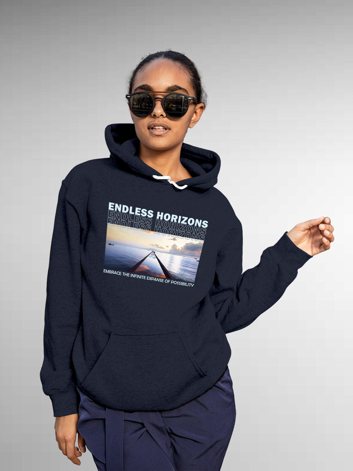 Model wearing Women's Navy Blue Hoodie Sweatshirt with 'Endless Horizons' design, offering effortless style and premium comfort
