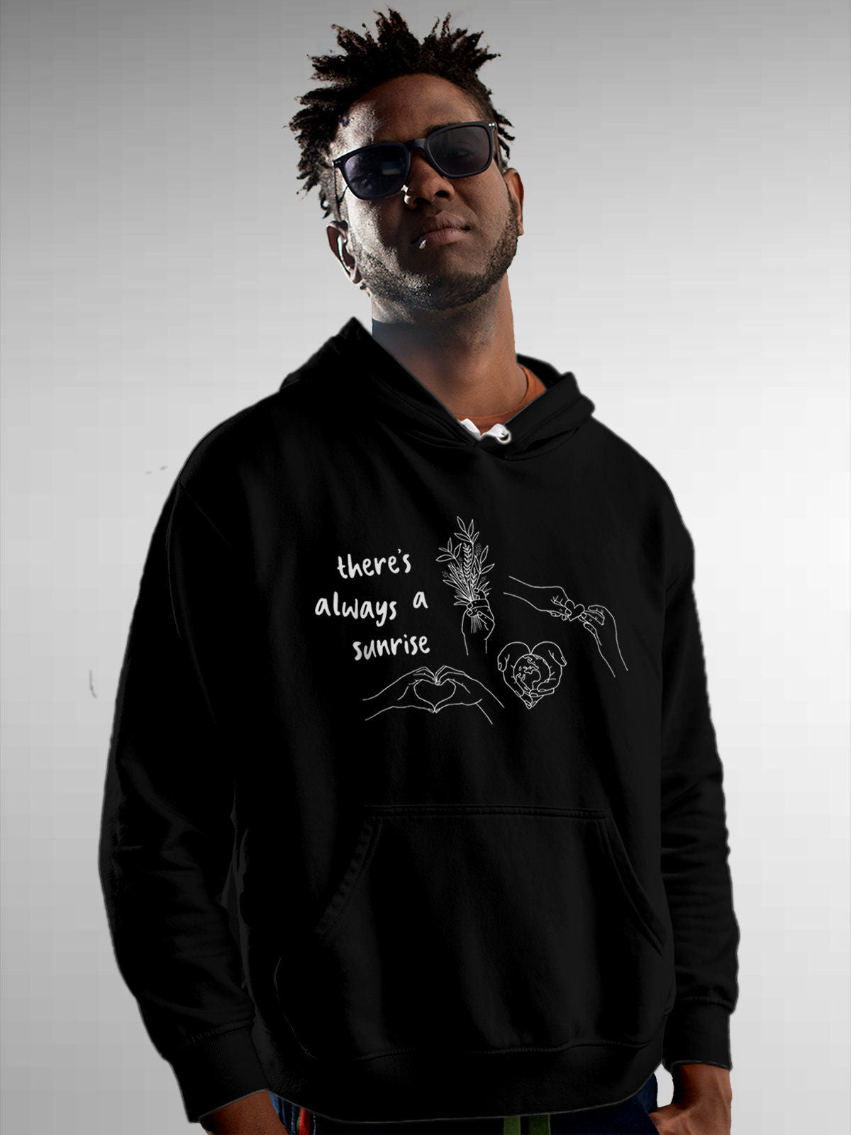Model wearing Men's Black Hoodie Sweatshirt with 'There's Always a Sunrise' design, offering effortless style and premium comfort
