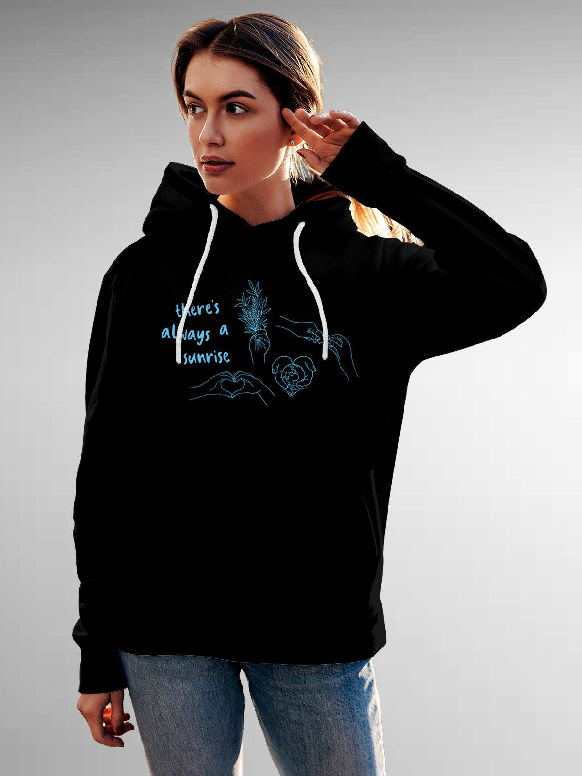 Model wearing Women's Black Hoodie Sweatshirt with 'There's Always a Sunrise' design, offering effortless style and premium comfort