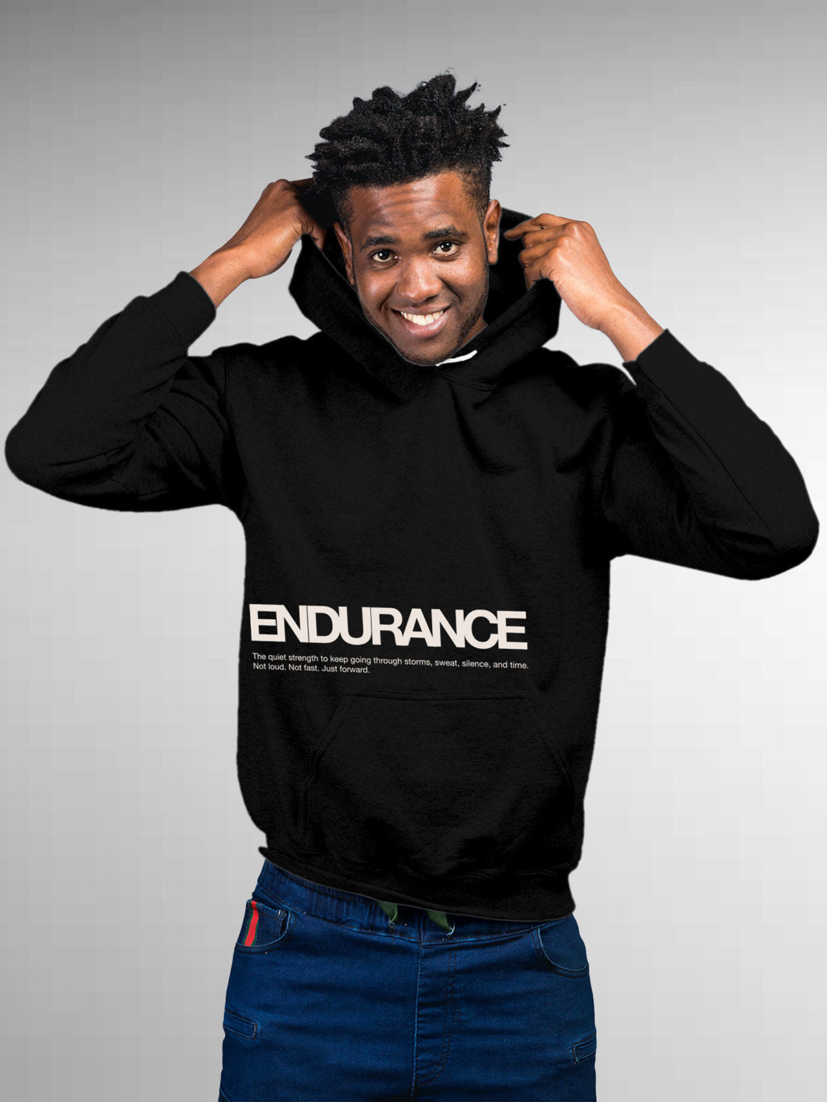 Model wearing Men's Black Hoodie Sweatshirt with 'Endurance' design, offering effortless style and premium comfort