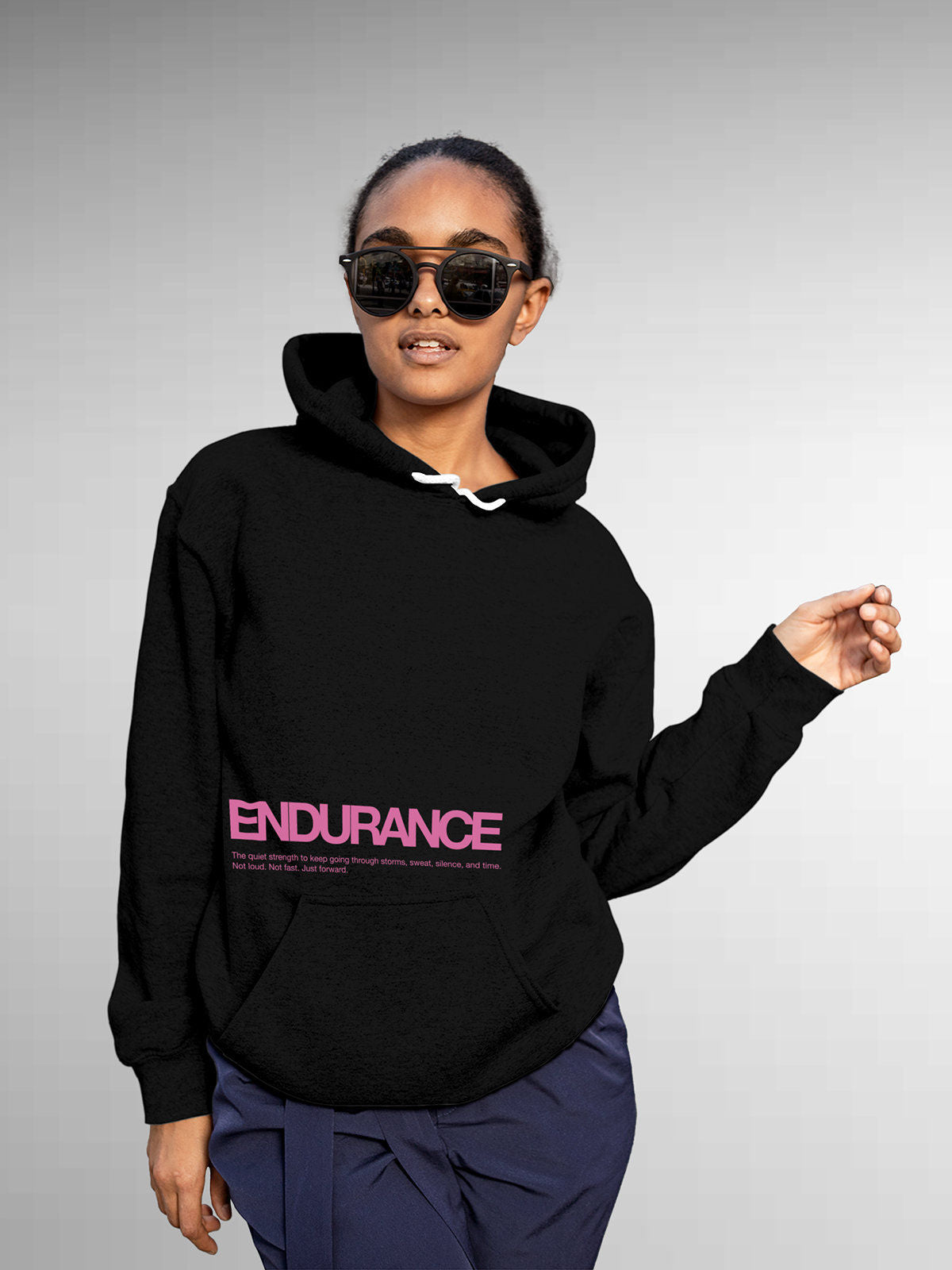 Model wearing Women's Black Hoodie Sweatshirt with 'Endurance' design, offering effortless style and premium comfort