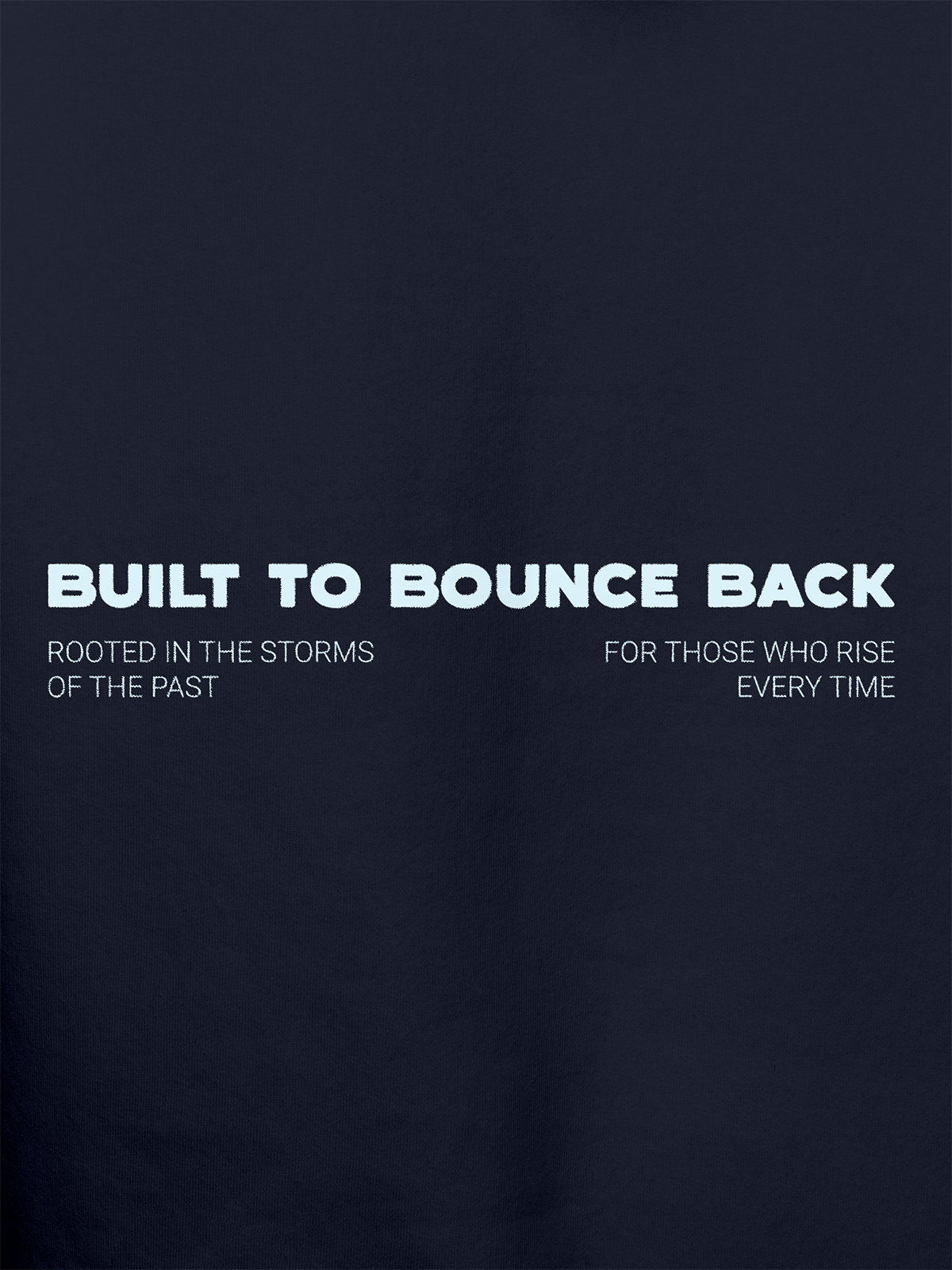 Close up of 'Built To Bounce Back' design on Women's Navy Blue Hoodie Sweatshirt, highlighting intricate details and vibrant print.