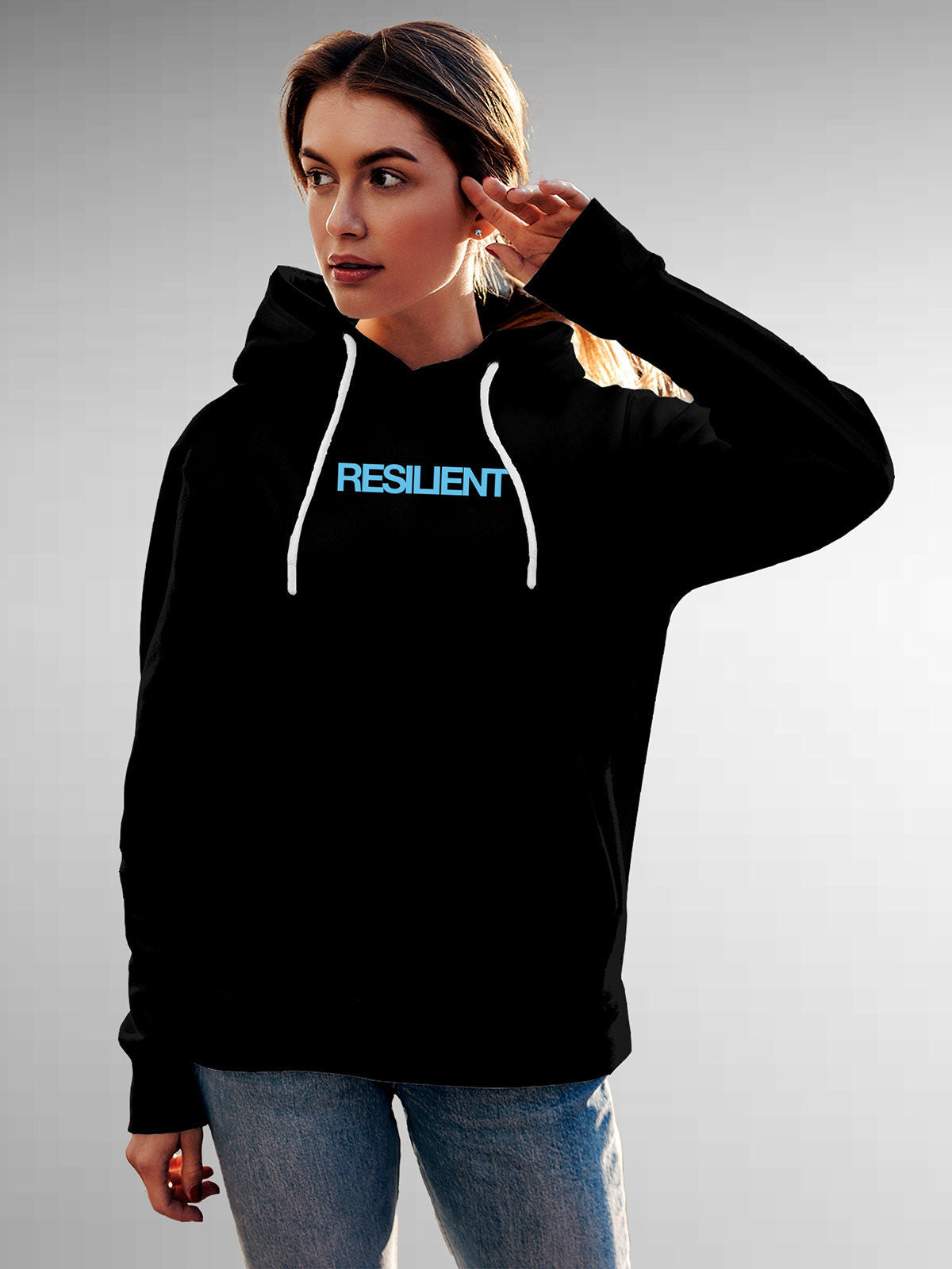 Model wearing Women's Black Hoodie Sweatshirt with 'Resilient' design, offering effortless style and premium comfort