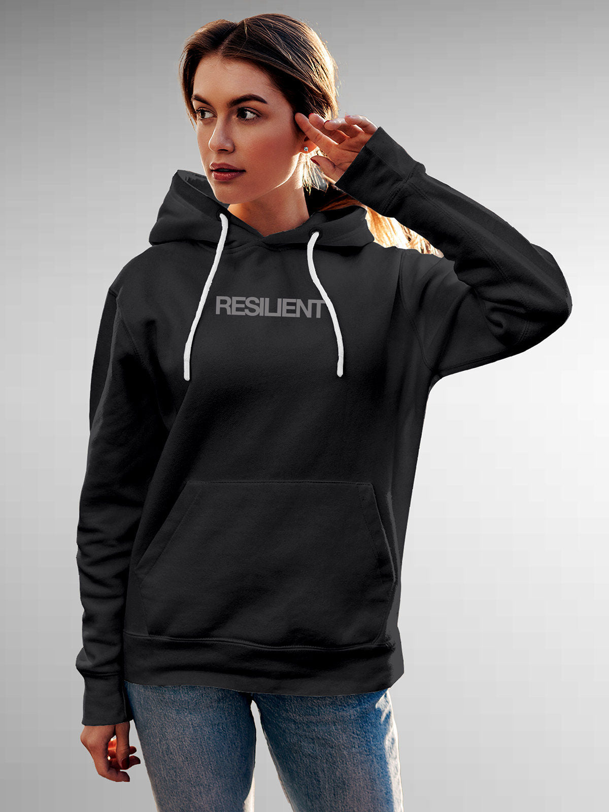 Model wearing Women's Dark Grey Hoodie Sweatshirt with 'Resilient' design, offering effortless style and premium comfort