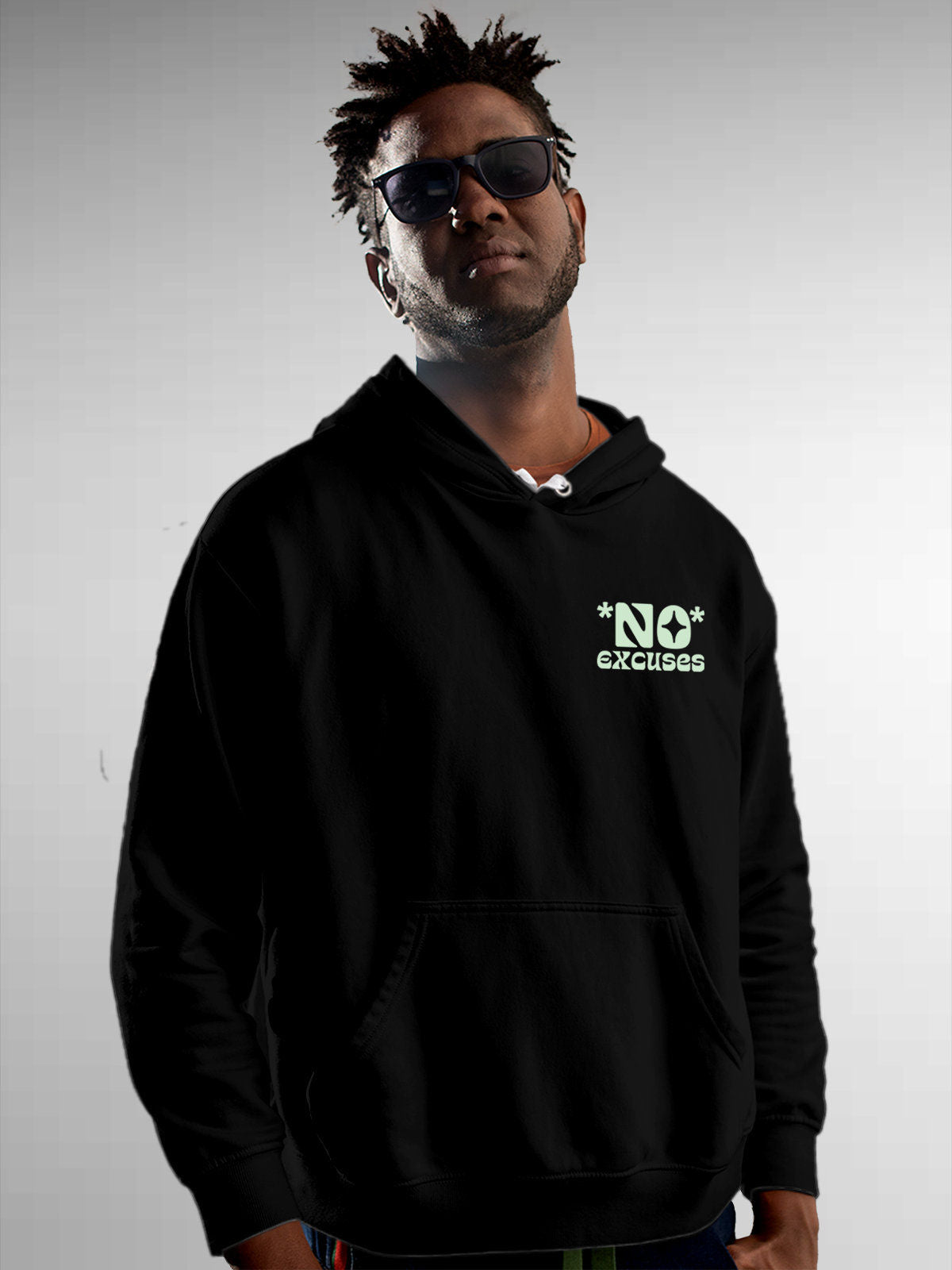 Model wearing Men's Black Hoodie Sweatshirt with 'No Excuses' design, offering effortless style and premium comfort