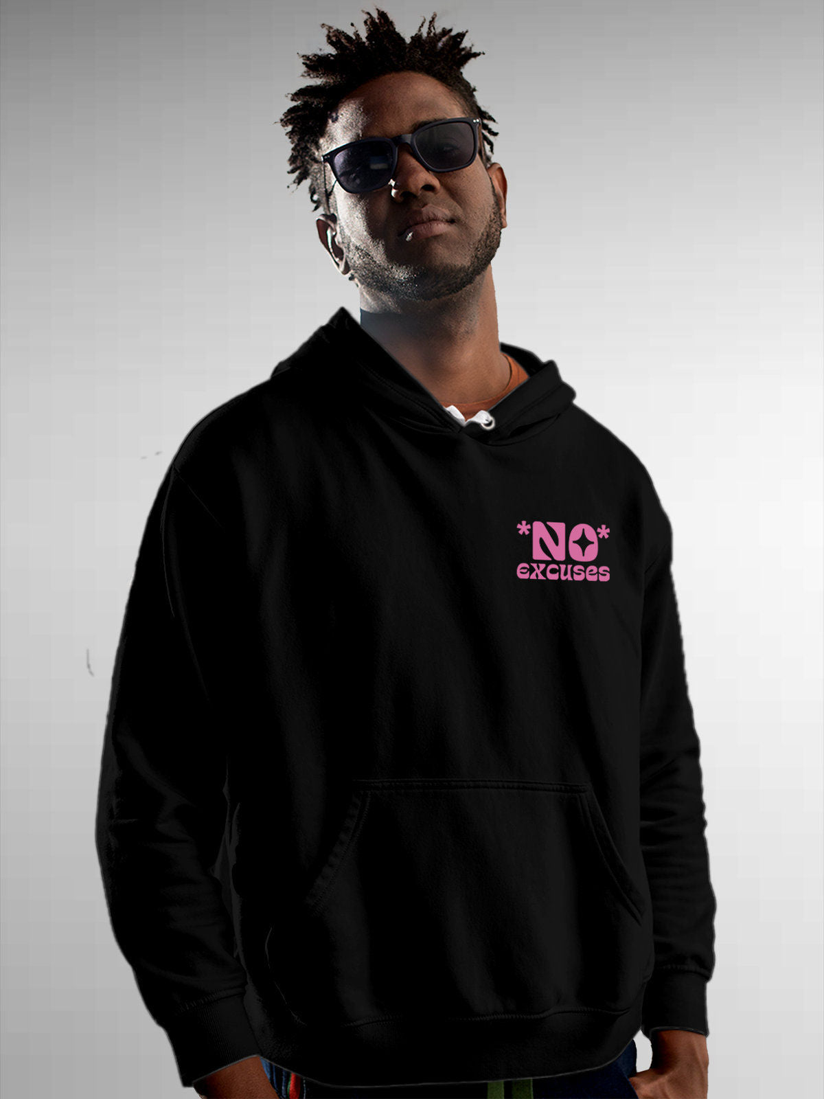Model wearing Men's Black Hoodie Sweatshirt with 'No Excuses' design, offering effortless style and premium comfort