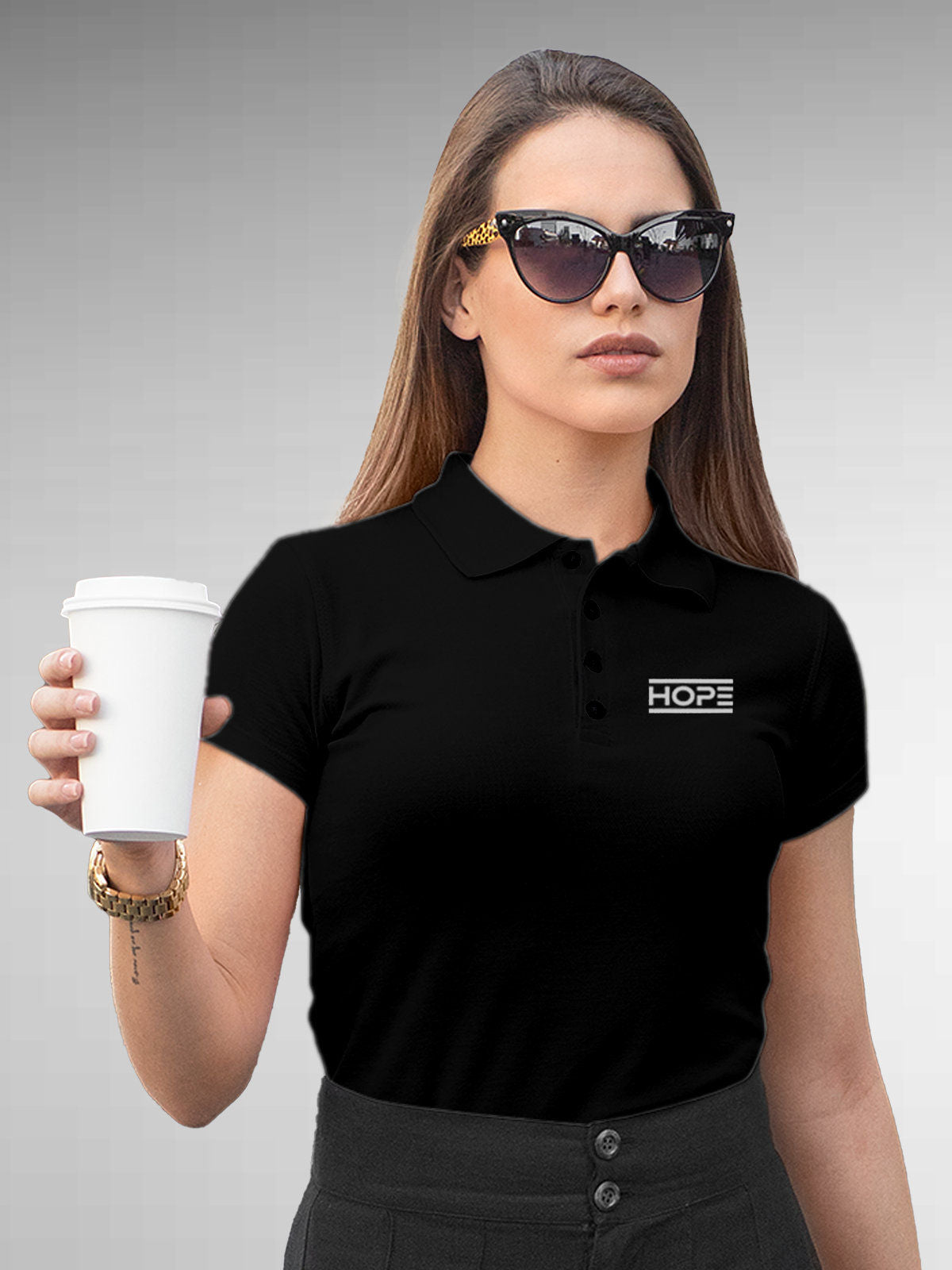 Model wearing Women's Black Polo T-shirt with 'Hope' design, offering effortless style and premium comfort