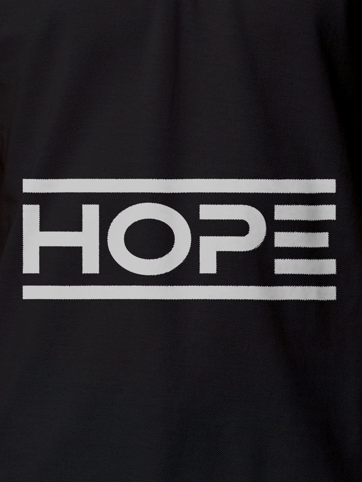 Close up of 'Hope' design on Men's Dark Grey Polo T-shirt, highlighting intricate details and vibrant print.