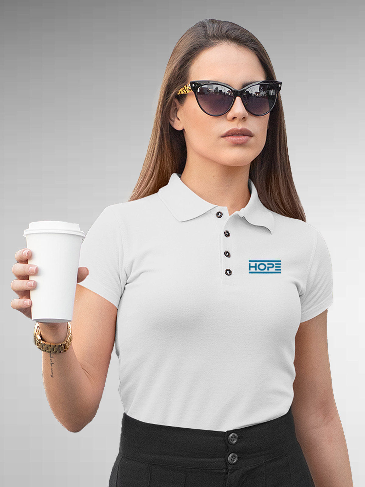 Model wearing Women's White Polo T-shirt with 'Hope' design, offering effortless style and premium comfort