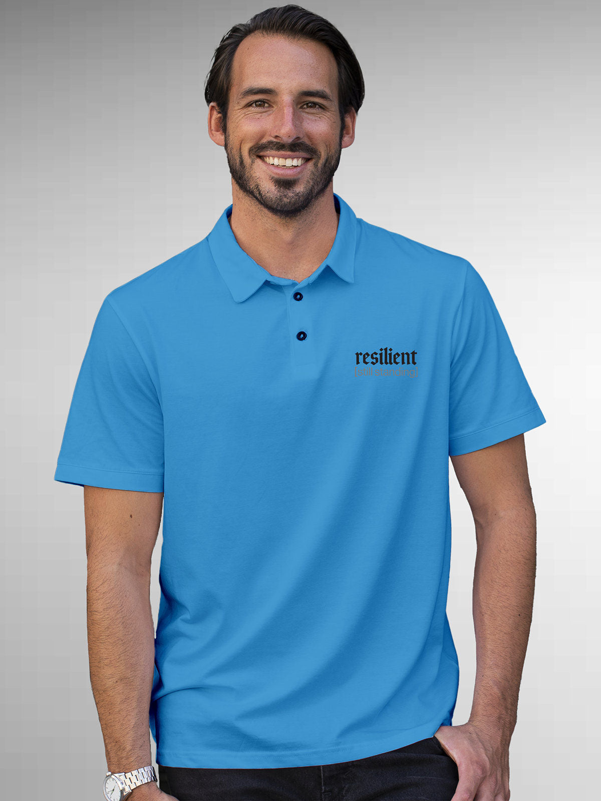Model wearing Men's Blue Polo T-shirt with 'Resilient' design, offering effortless style and premium comfort