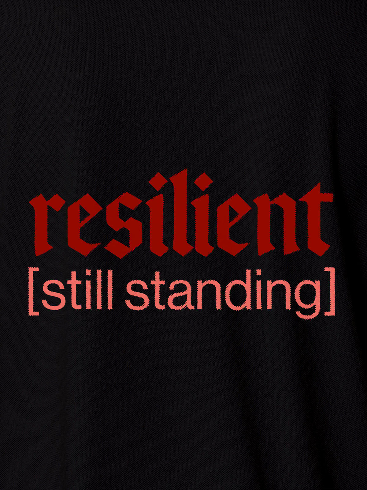 Close up of 'Resilient' design on Men's Black Polo T-shirt, highlighting intricate details and vibrant print.