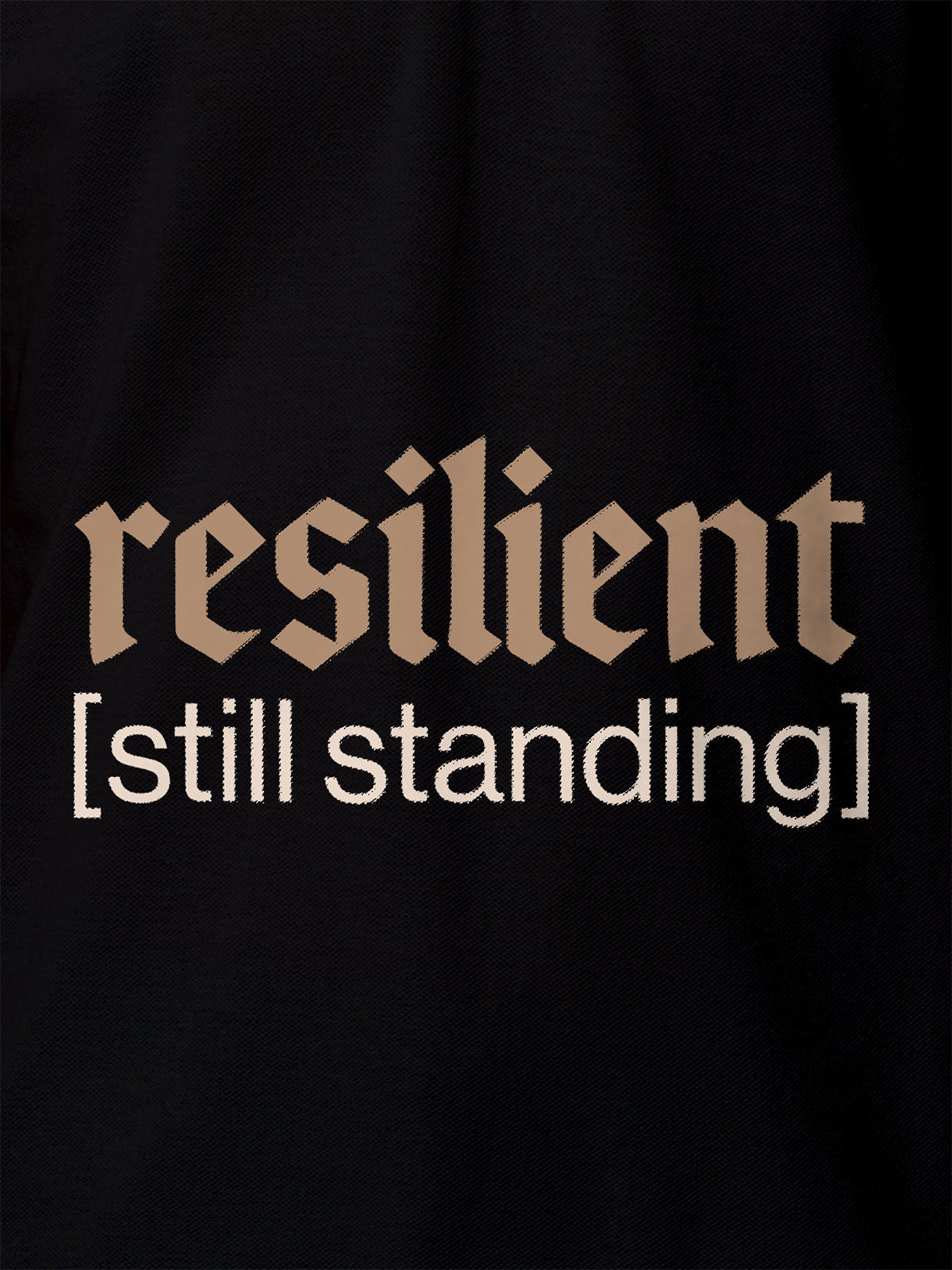Close up of 'Resilient' design on Women's Black Polo T-shirt, highlighting intricate details and vibrant print.