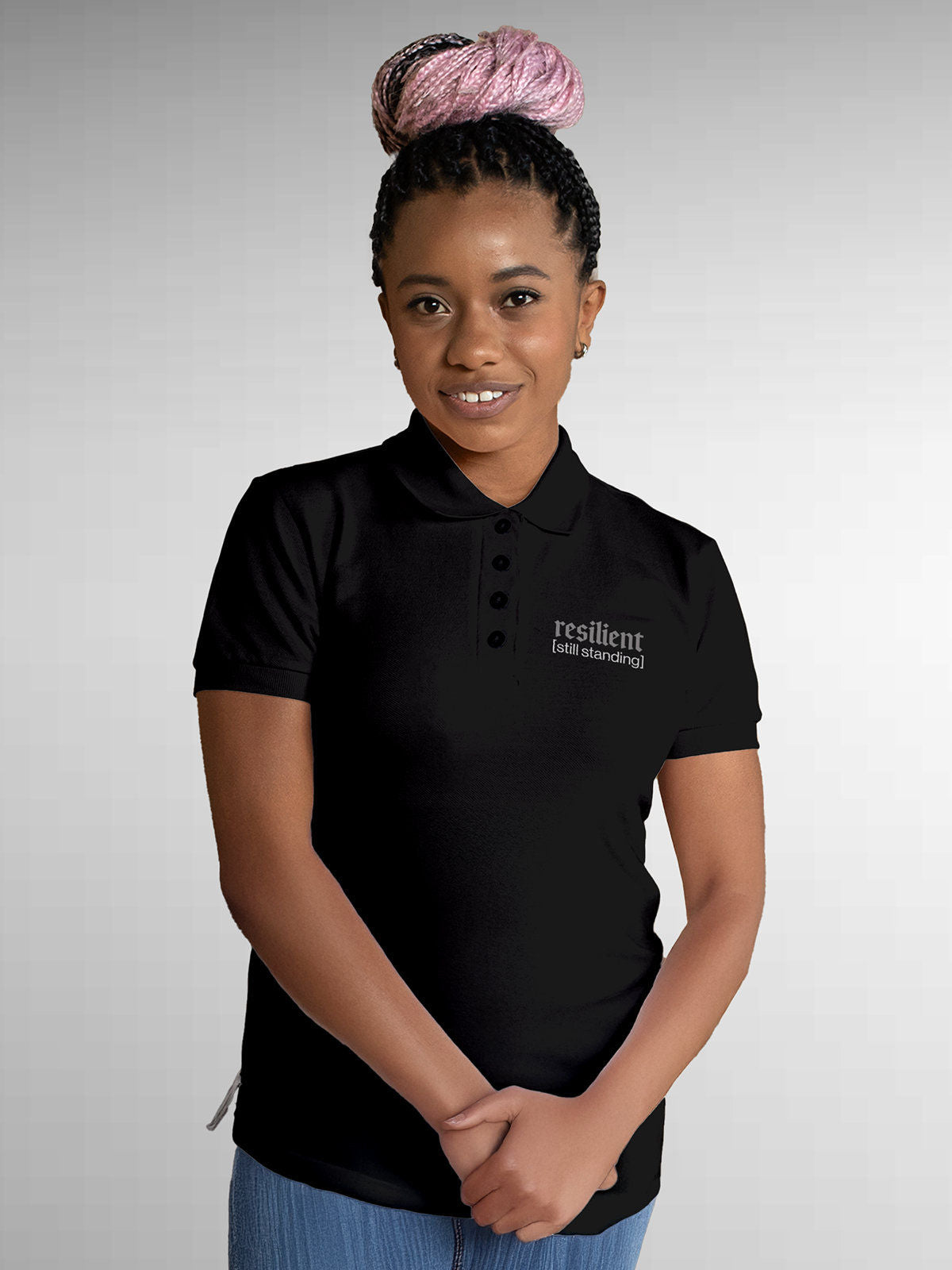 Model wearing Women's Black Polo T-shirt with 'Resilient' design, offering effortless style and premium comfort