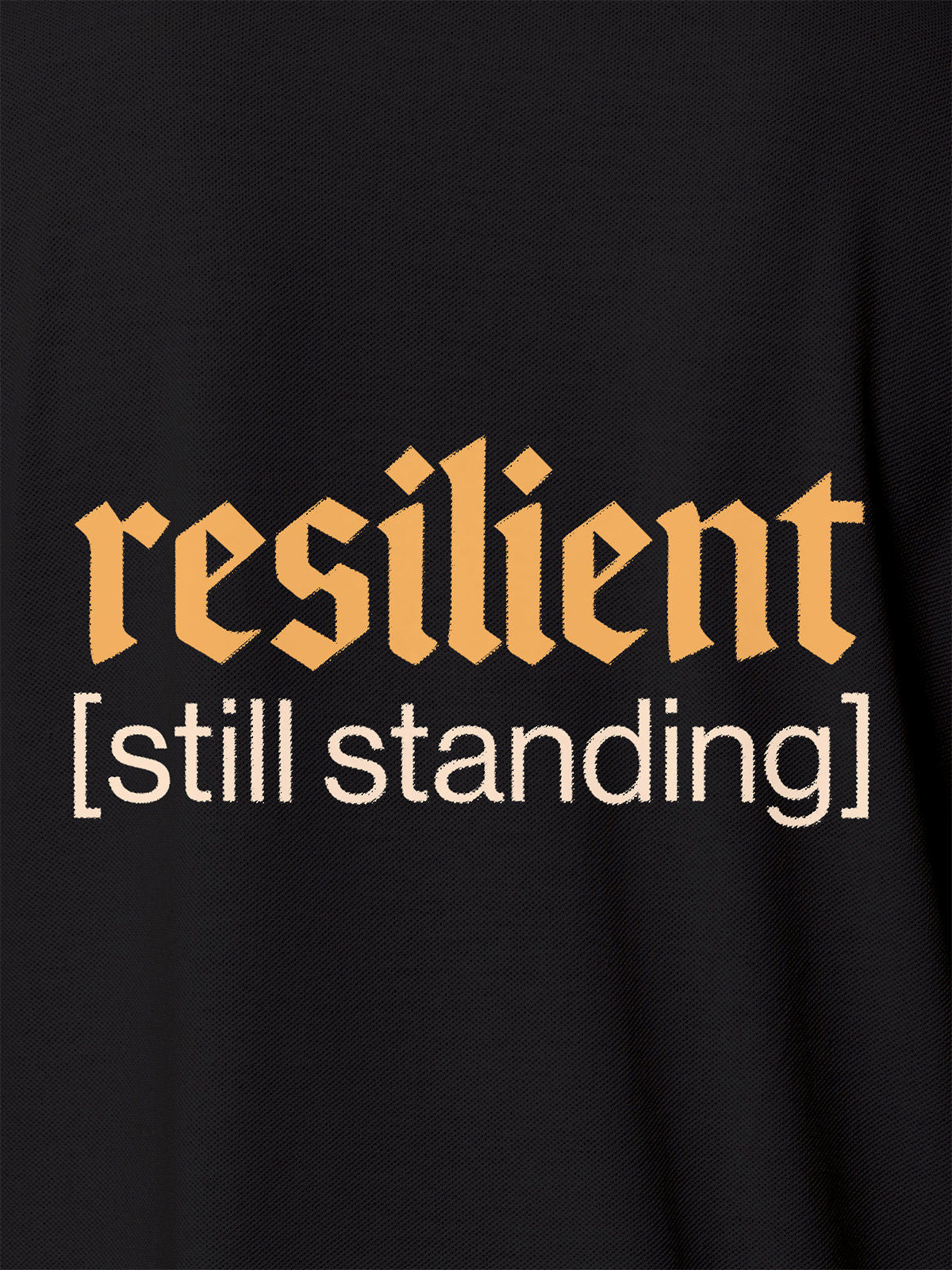 Close up of 'Resilient' design on Men's Dark Grey Polo T-shirt, highlighting intricate details and vibrant print.