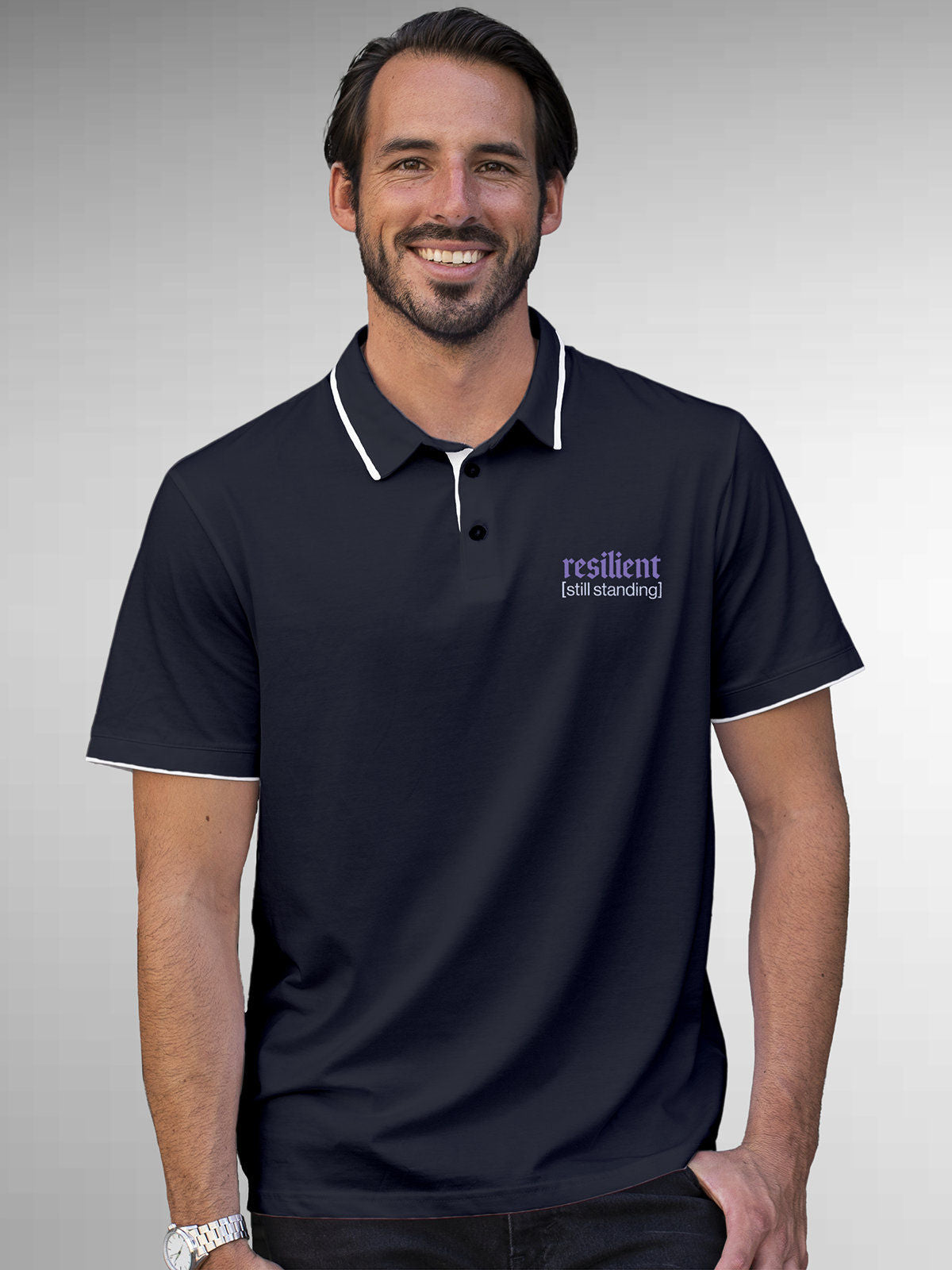 Model wearing Men's Navy Blue Polo T-shirt with 'Resilient' design, offering effortless style and premium comfort