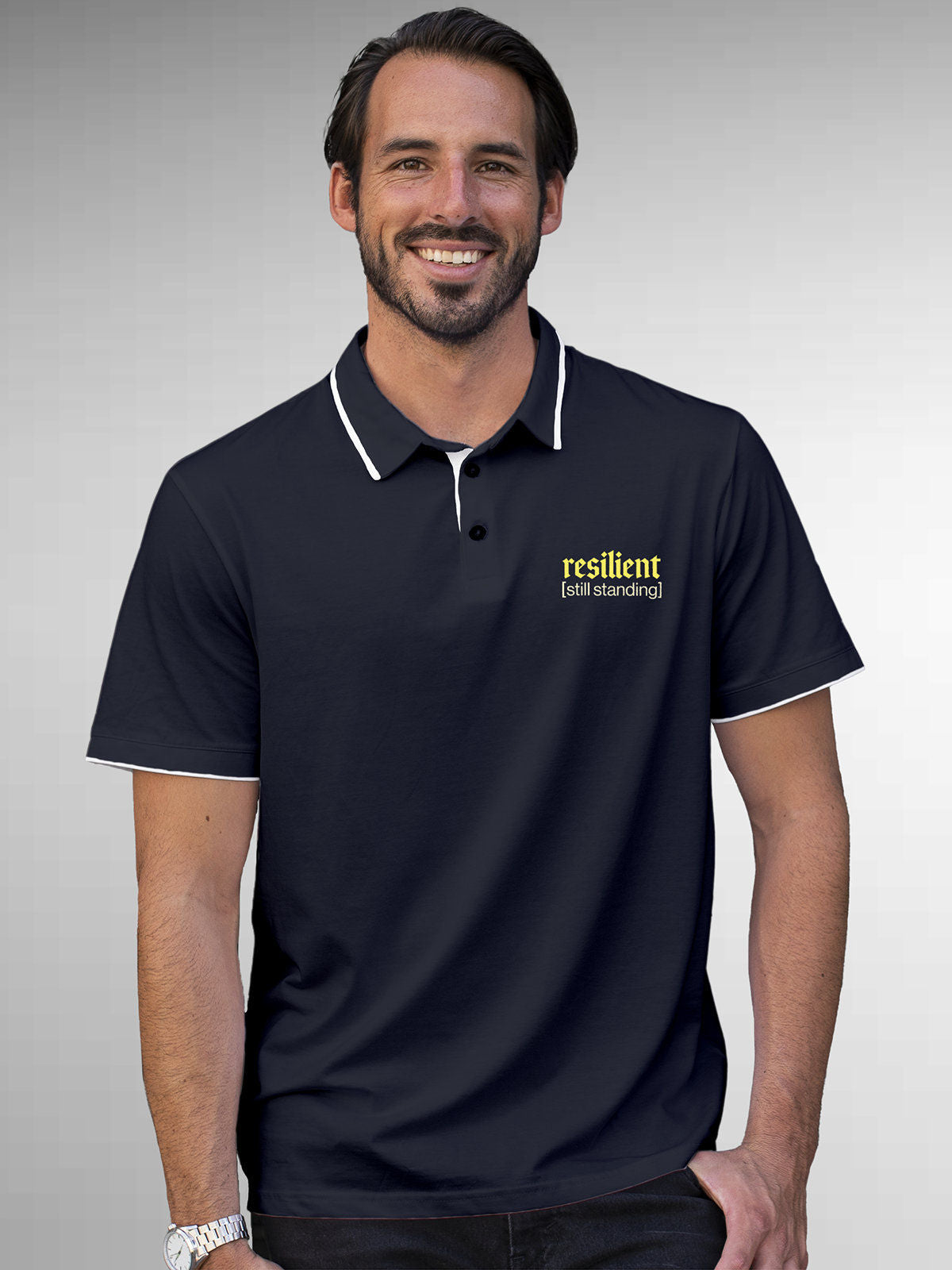 Model wearing Men's Navy Blue Polo T-shirt with 'Resilient' design, offering effortless style and premium comfort