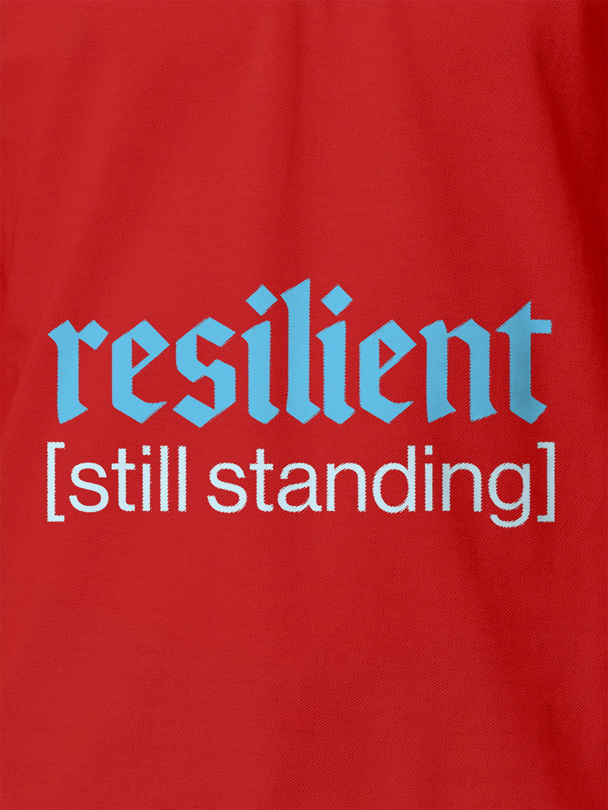 Close up of 'Resilient' design on Women's Red Polo T-shirt, highlighting intricate details and vibrant print.