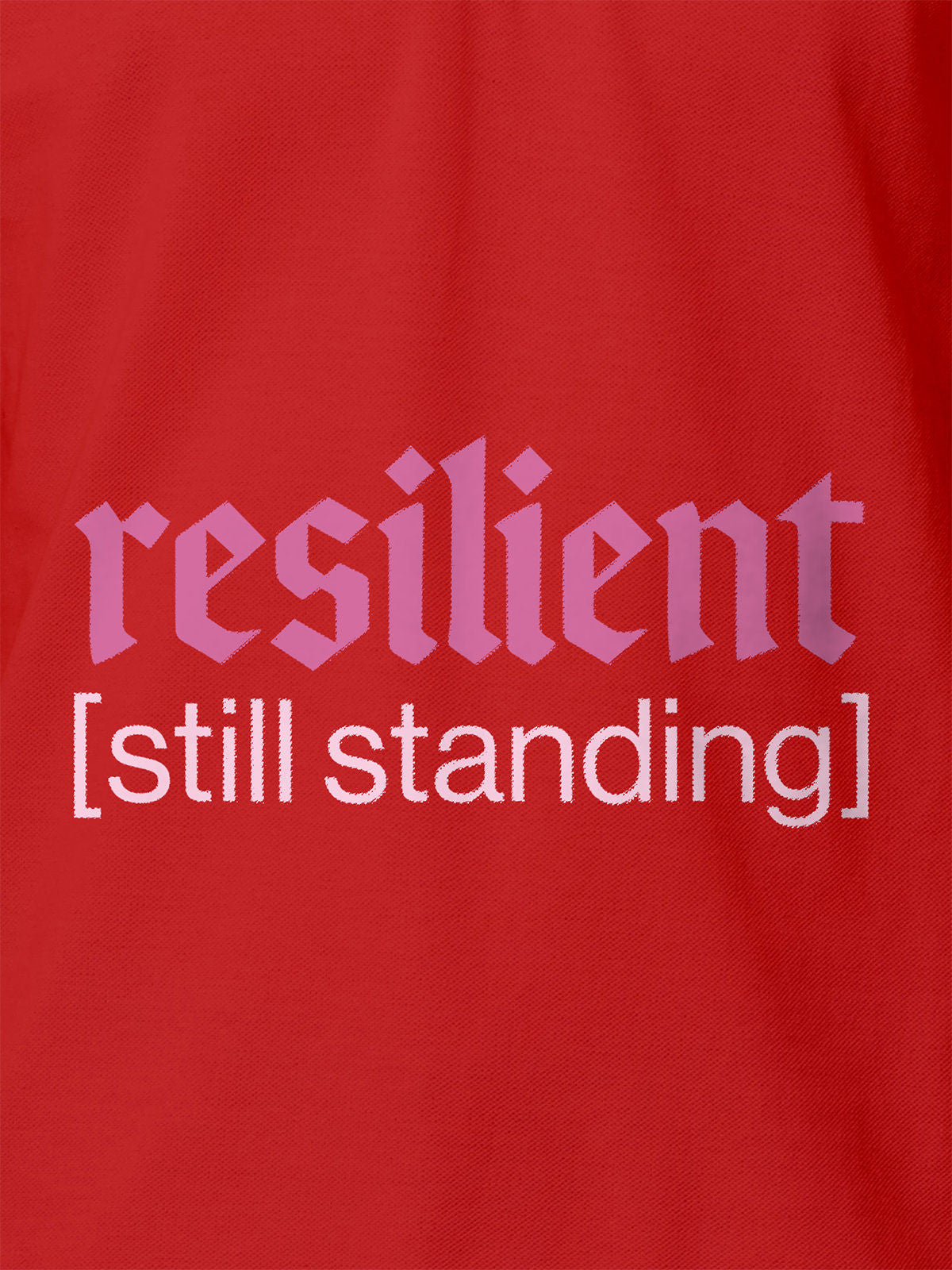 Close up of 'Resilient' design on Women's Red Polo T-shirt, highlighting intricate details and vibrant print.