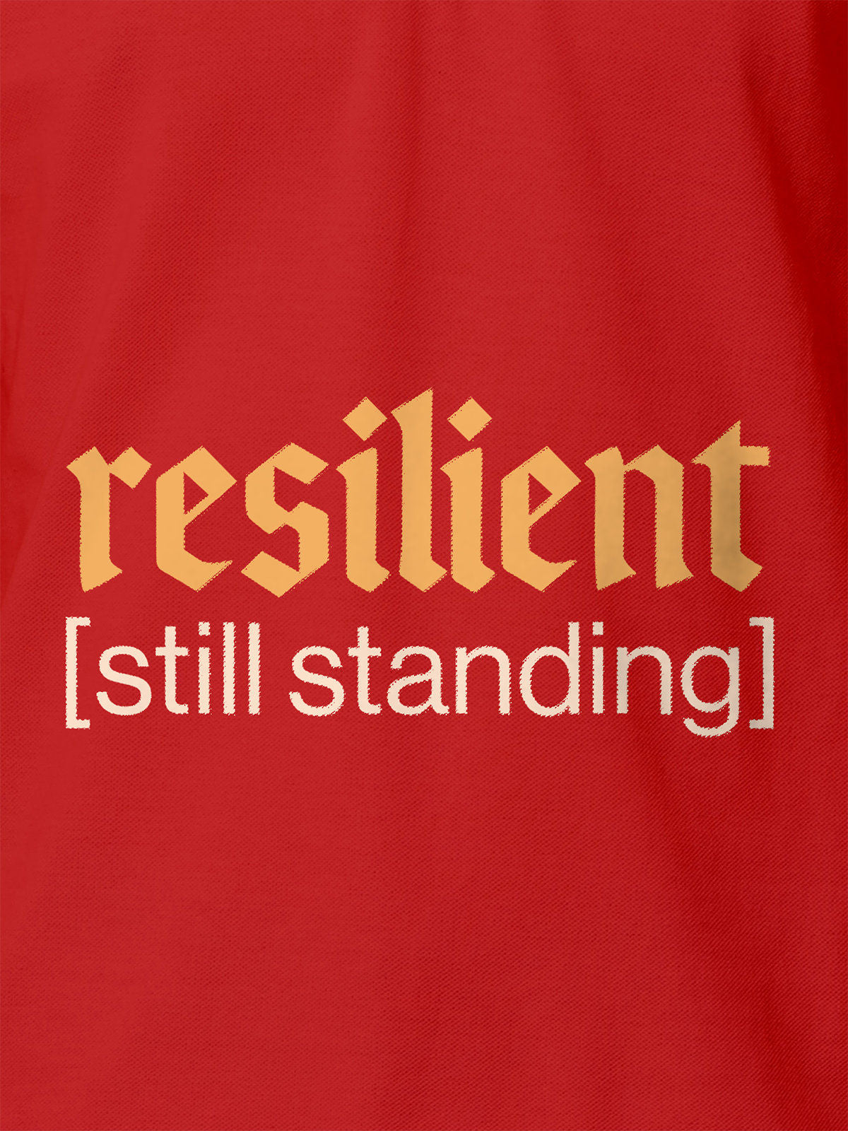 Close up of 'Resilient' design on Women's Red Polo T-shirt, highlighting intricate details and vibrant print.