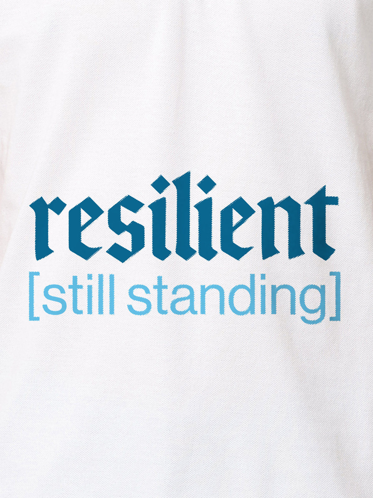 Close up of 'Resilient' design on Women's White Polo T-shirt, highlighting intricate details and vibrant print.