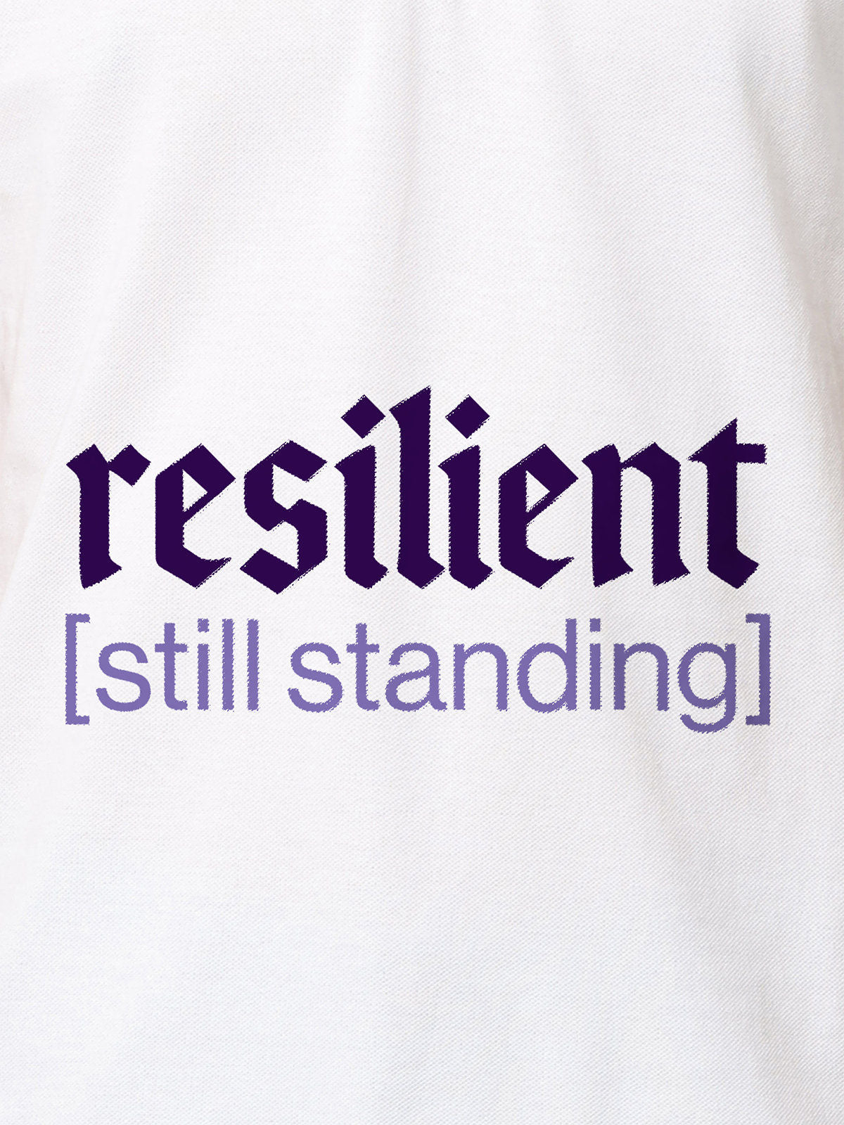 Close up of 'Resilient' design on Women's White Polo T-shirt, highlighting intricate details and vibrant print.