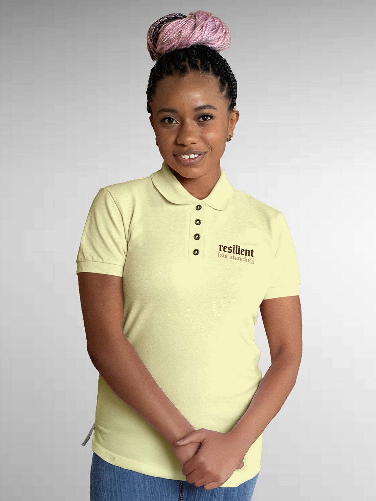 Model wearing Women's Yellow Polo T-shirt with 'Resilient' design, offering effortless style and premium comfort