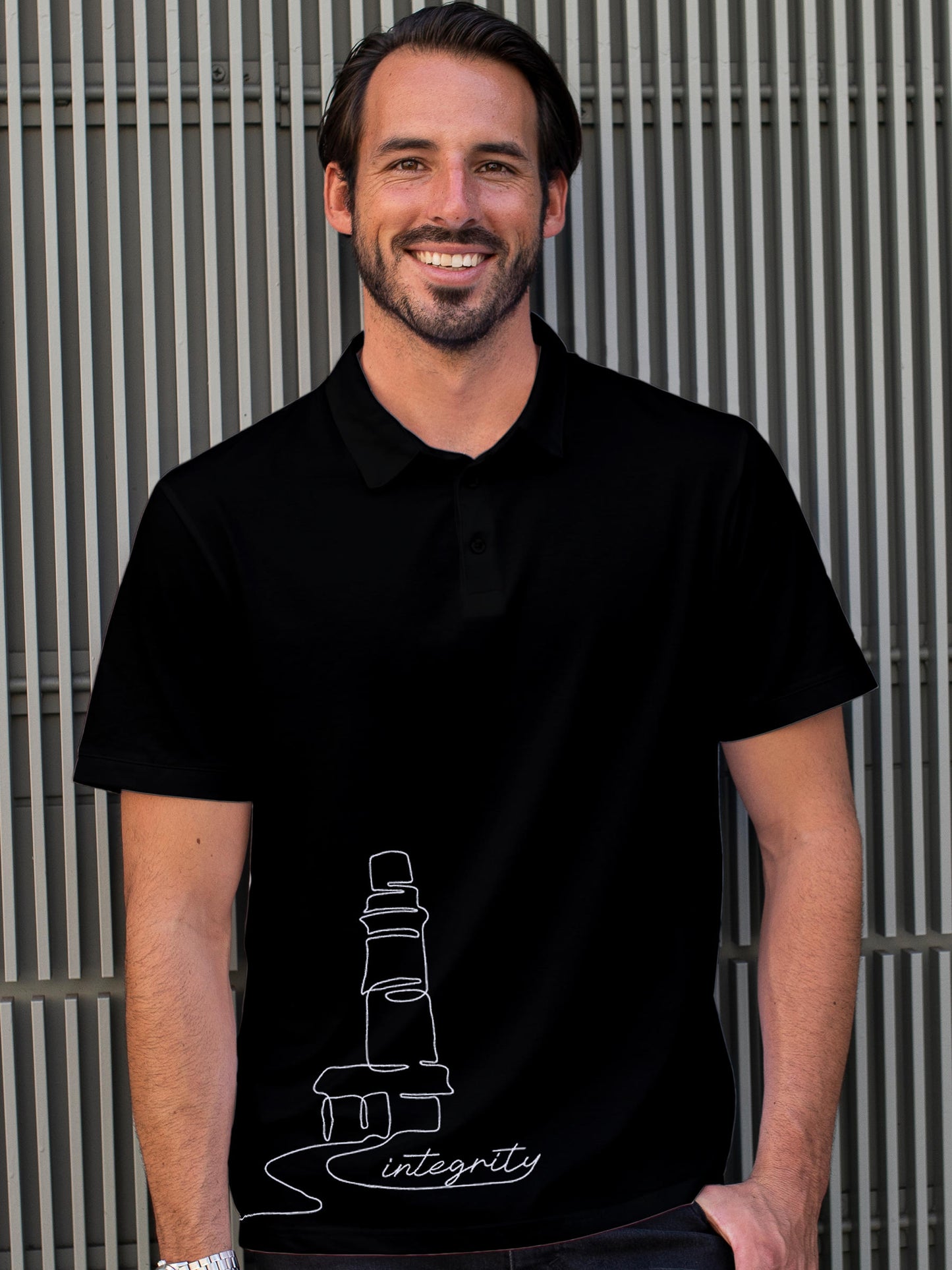 Model wearing Men's Black Polo T-shirt with 'Integrity' design, offering effortless style and premium comfort
