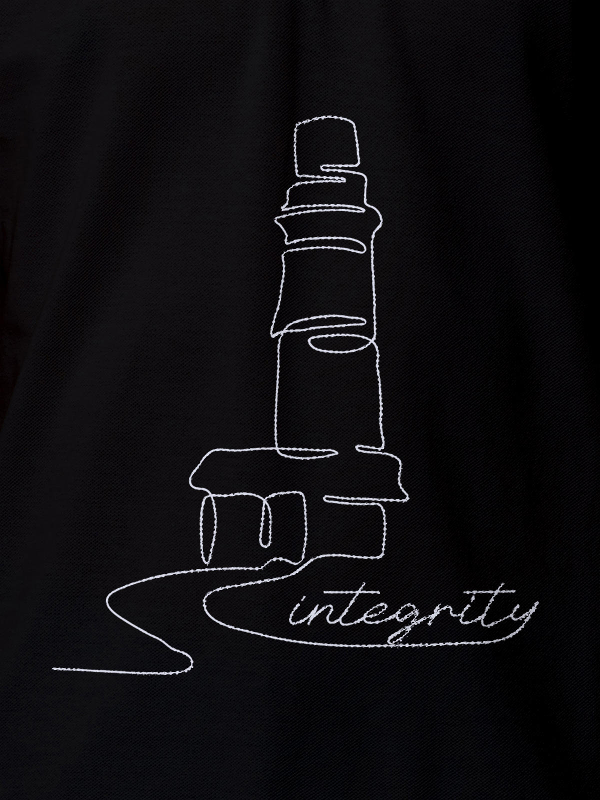 Close up of 'Integrity' design on Men's Black Polo T-shirt, highlighting intricate details and vibrant print.